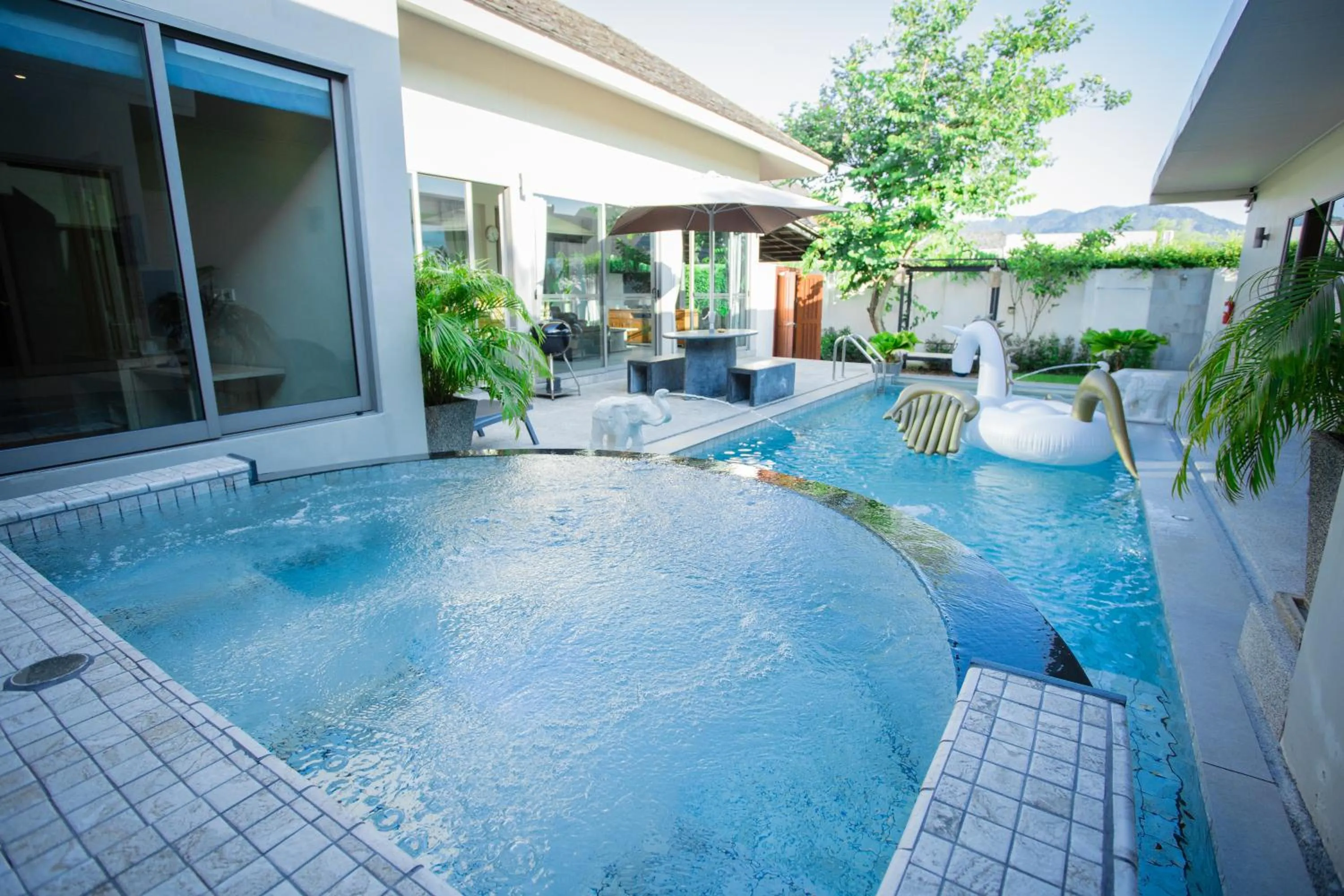 Swimming pool in Yipmunta Pool Villa - SHA Plus Certified