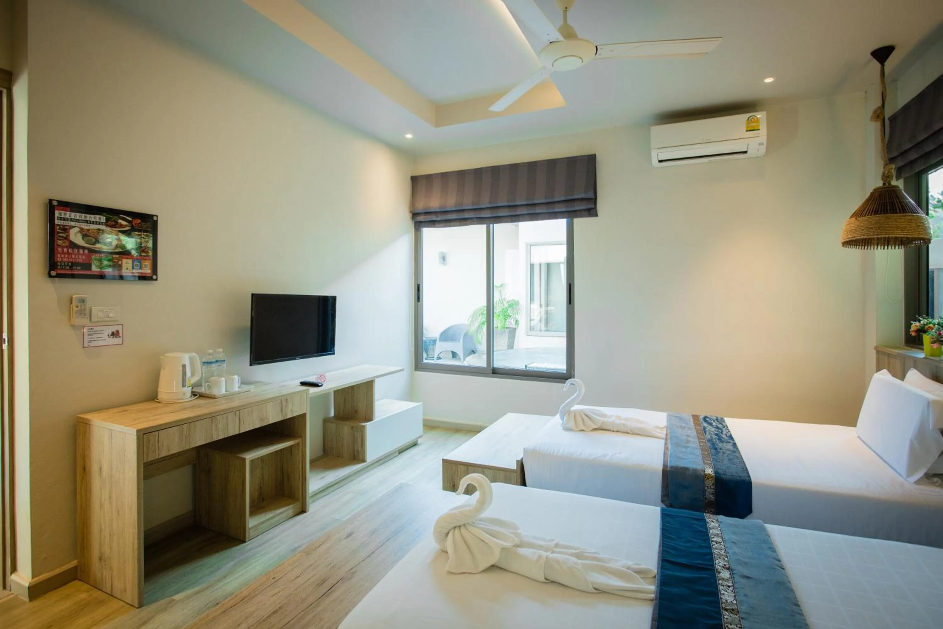 Photo of the whole room, Bed in Yipmunta Pool Villa - SHA Plus Certified