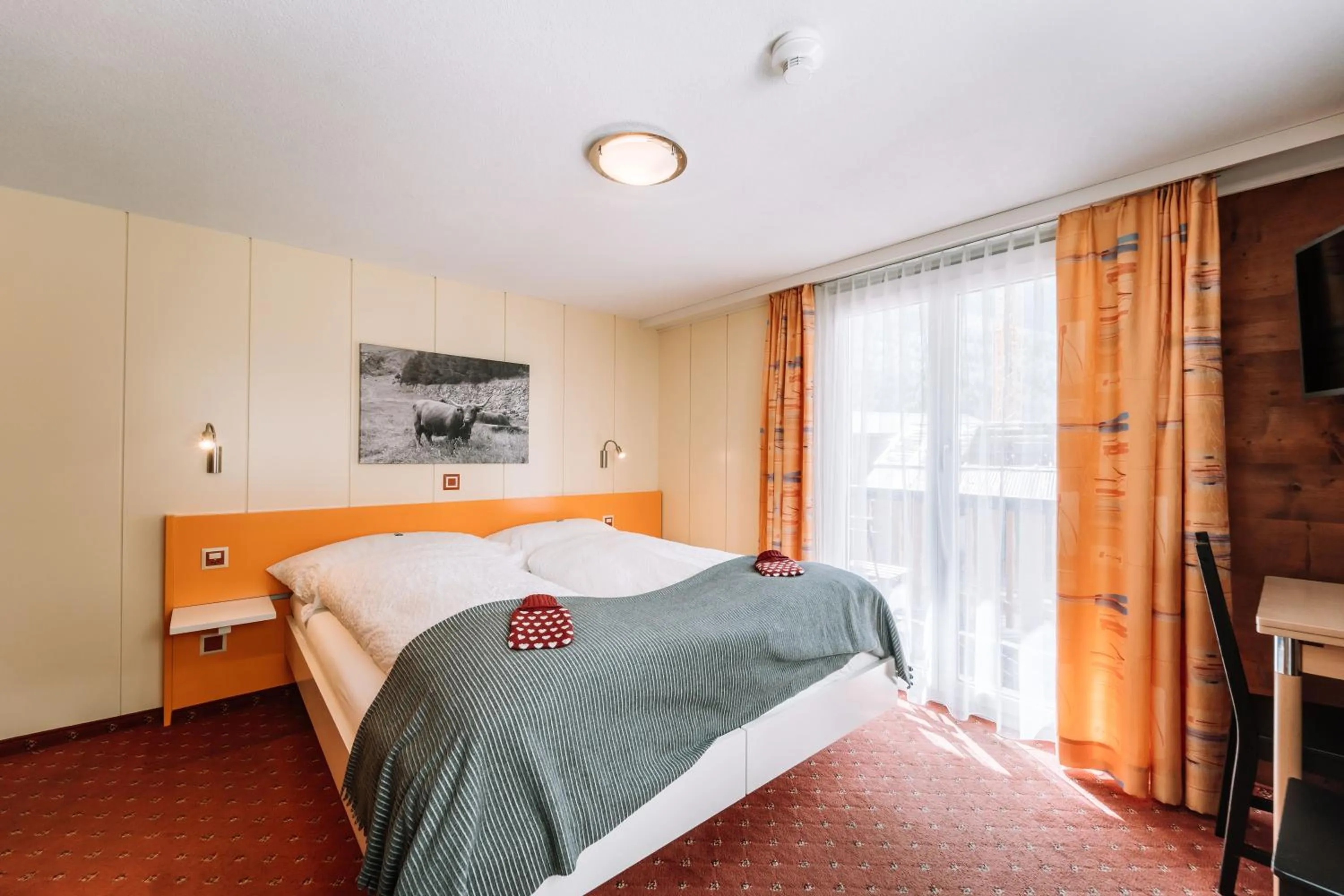 Bed in Hotel Les Amis