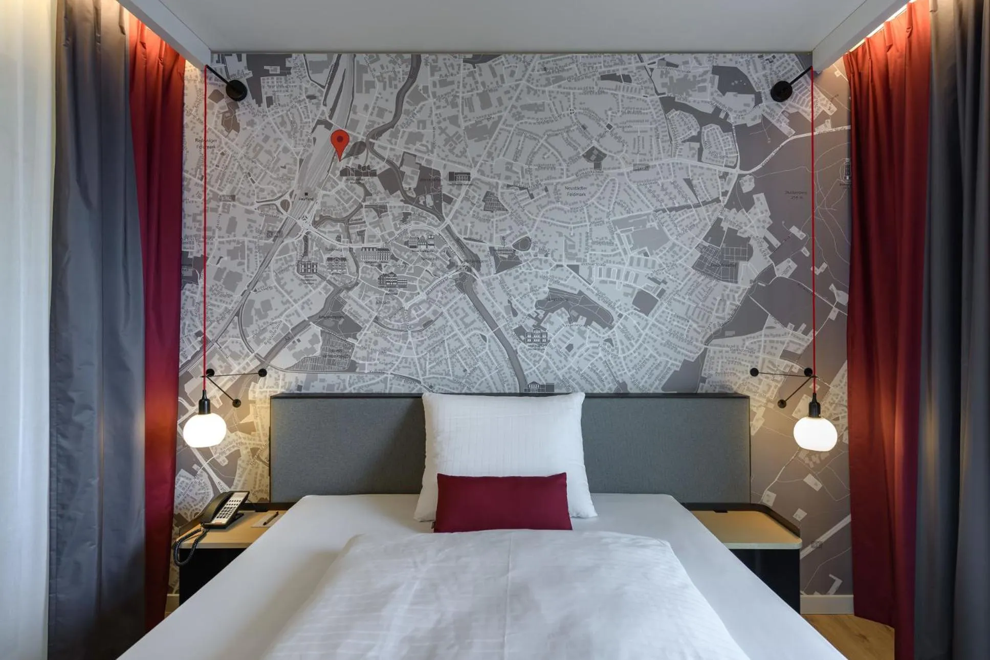 Bed in IntercityHotel Herford