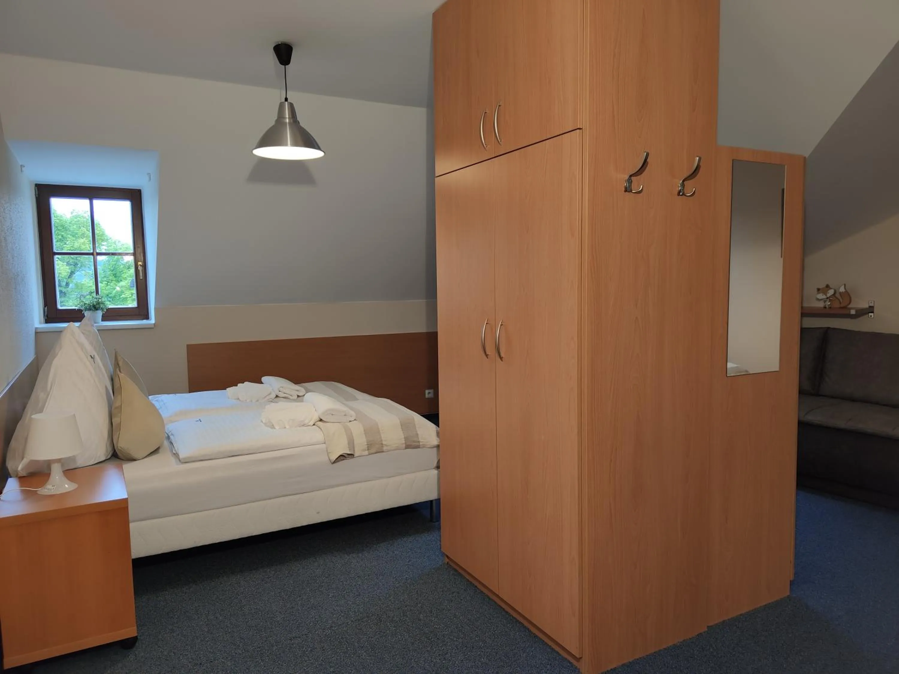 Bed in Hotel Modrásek