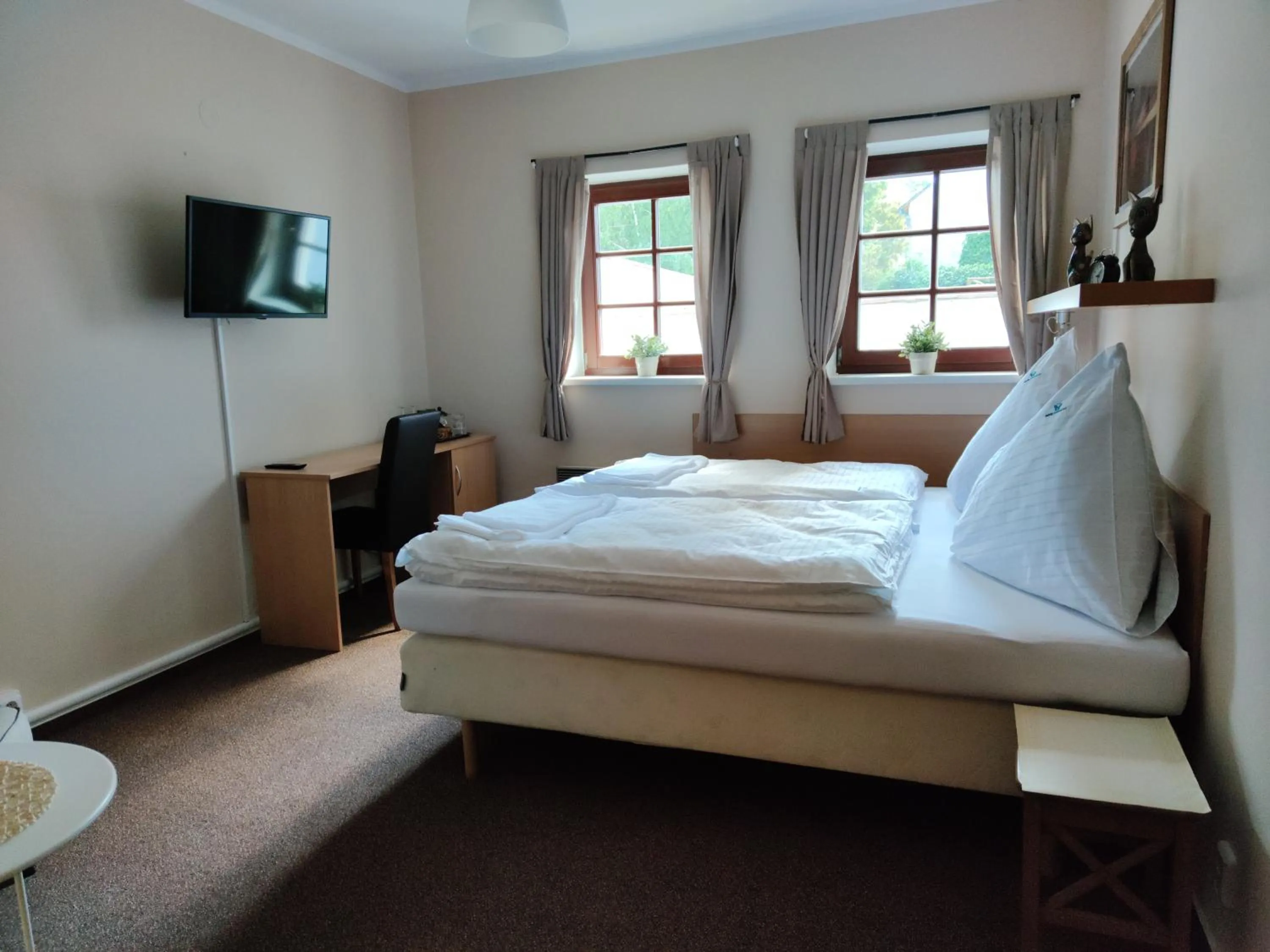 Bed in Hotel Modrásek