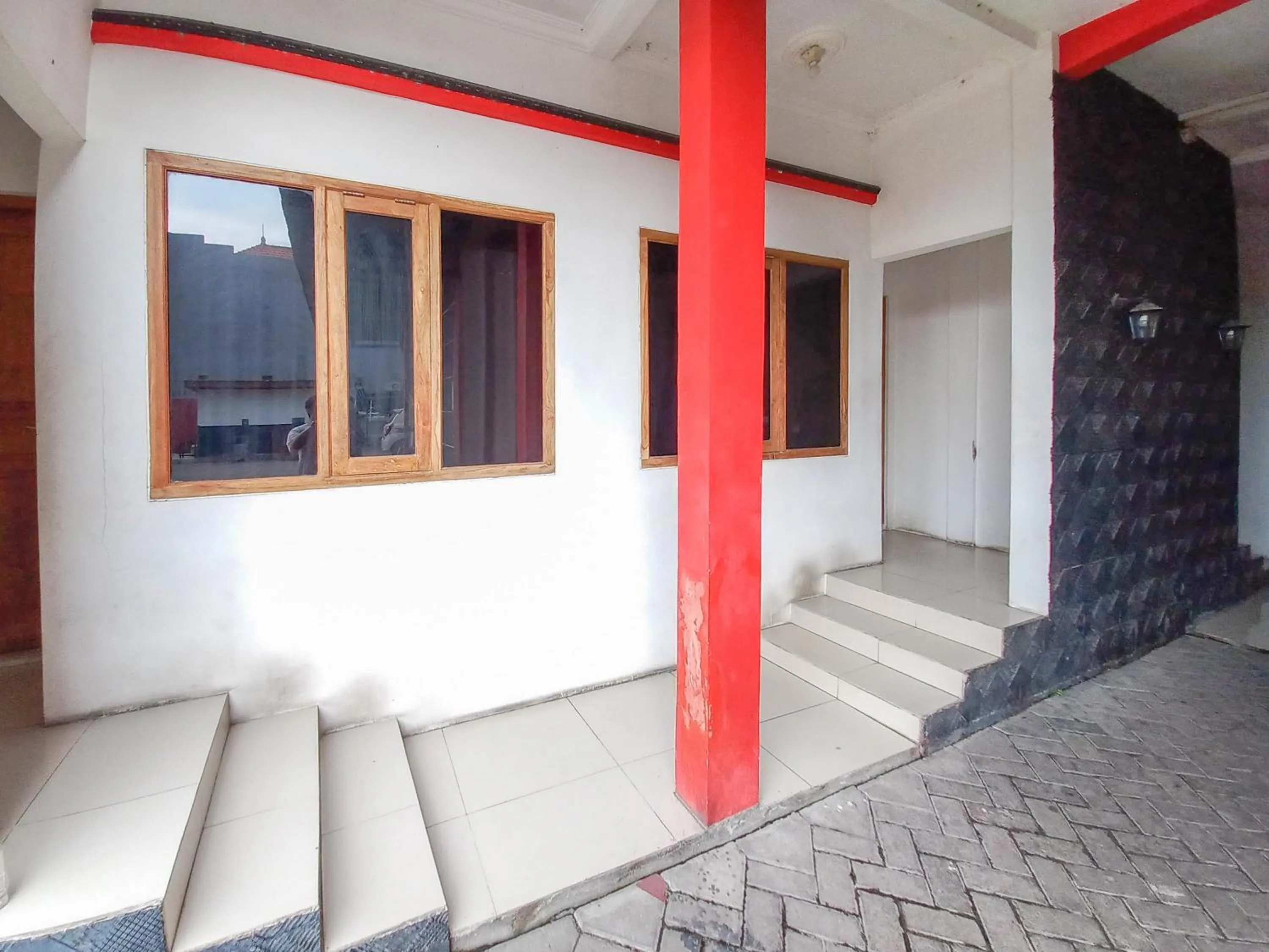Property building in RedDoorz Syariah at Homestay Bougenville near Taman Alun-Alun Kota Lamongan