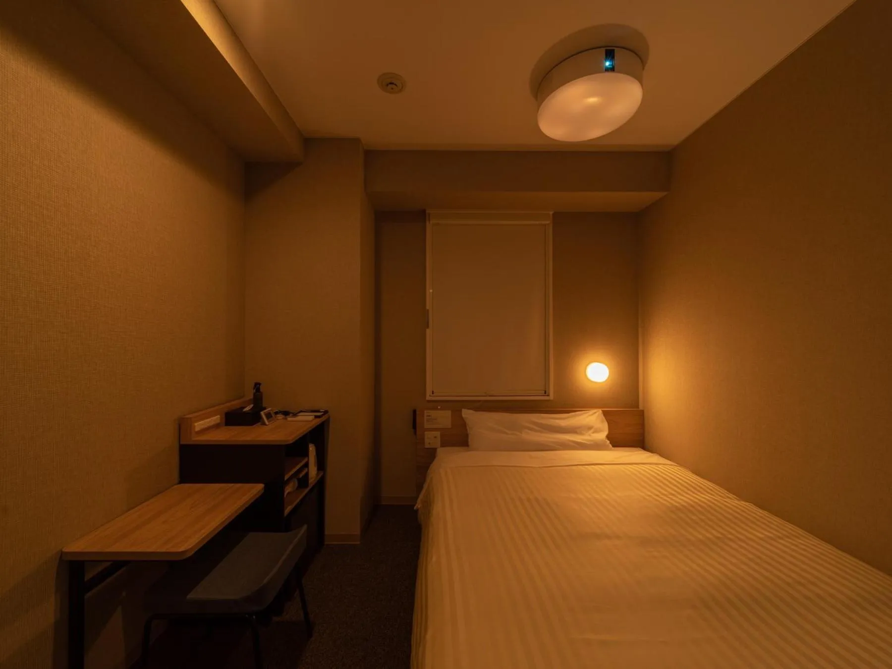 Bed in Super Hotel Iyo Saijo