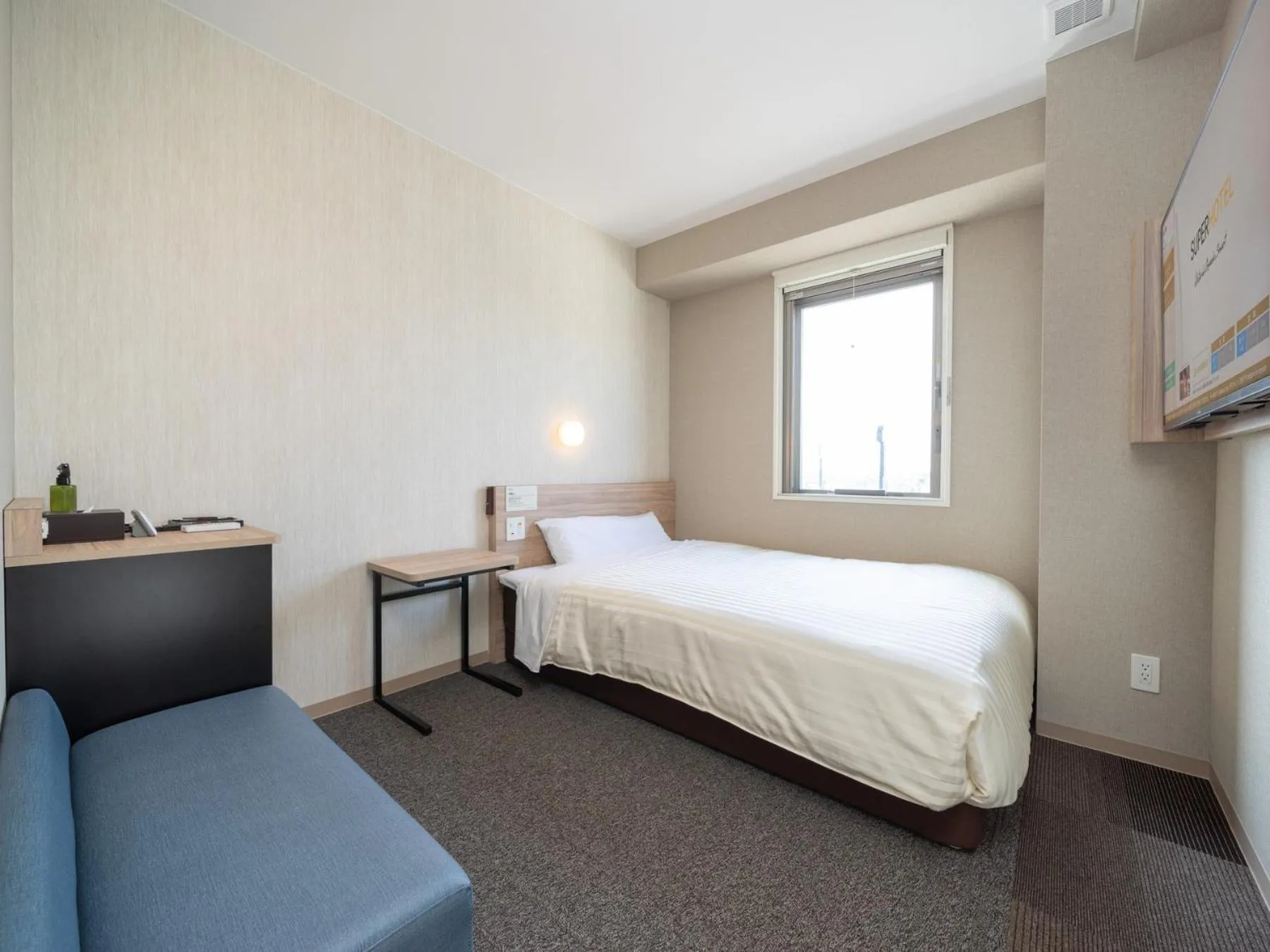 Bed in Super Hotel Iyo Saijo