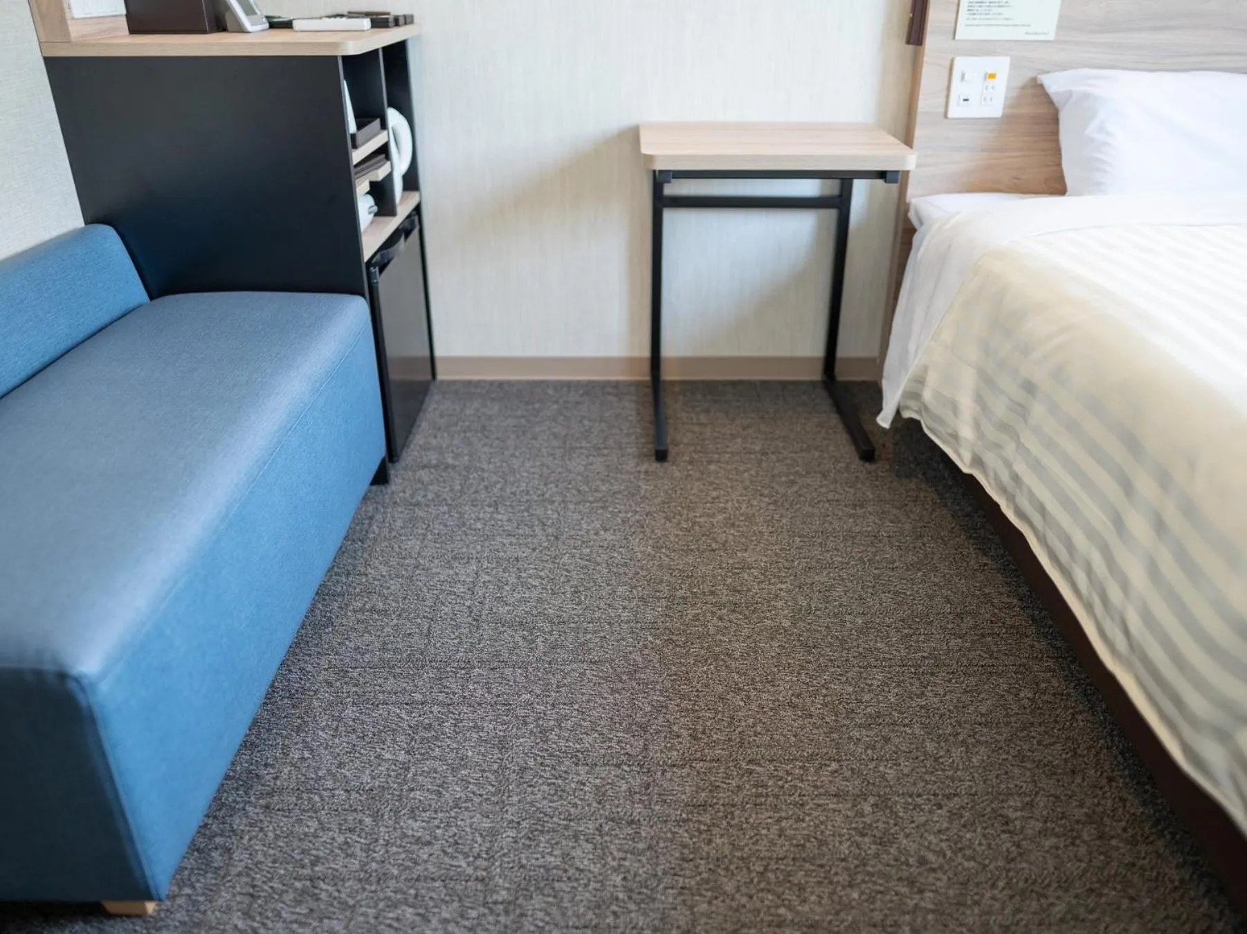 Bed in Super Hotel Iyo Saijo