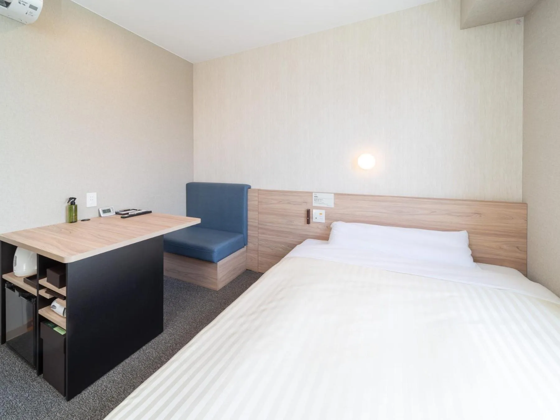 Bed in Super Hotel Iyo Saijo