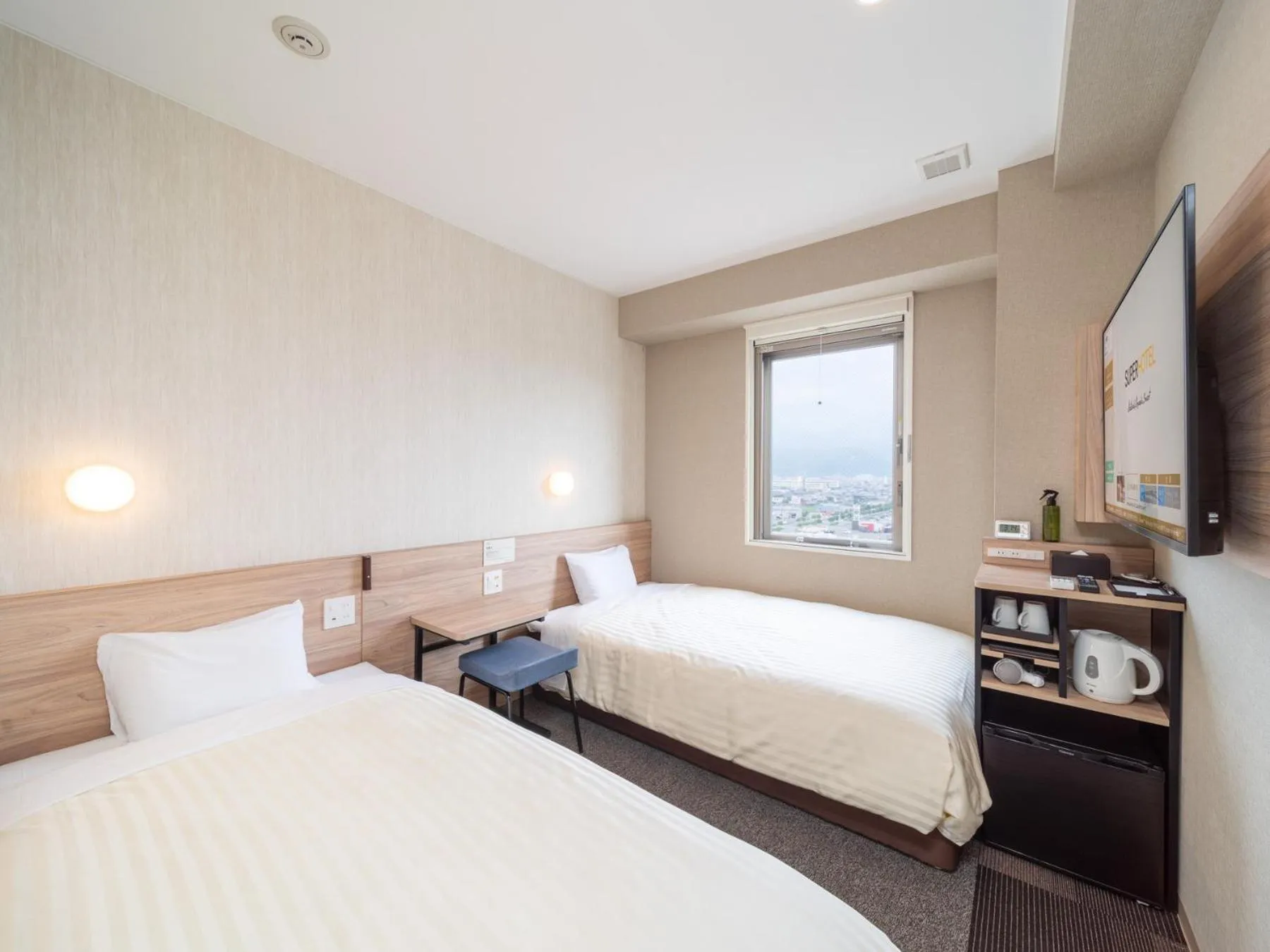 Bed in Super Hotel Iyo Saijo