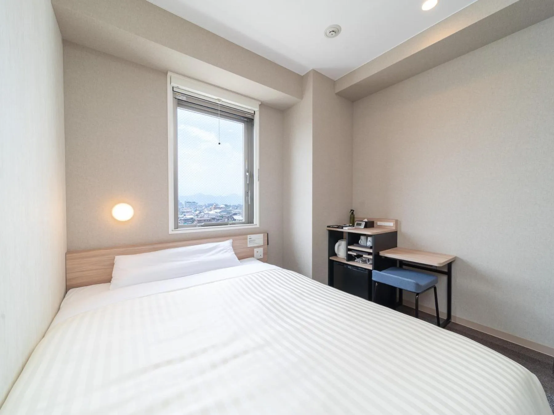 Bed in Super Hotel Iyo Saijo