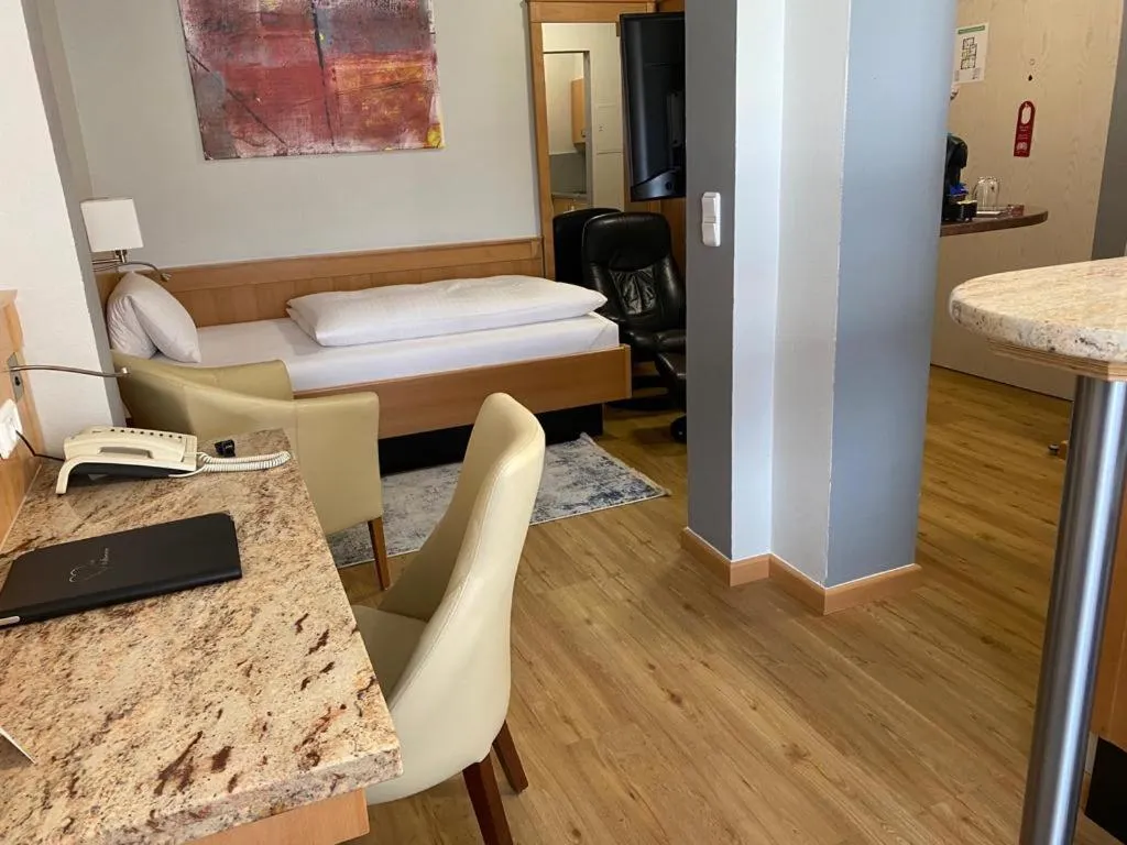 Bed in Apartment Hotel KRAL - BUSINESS HOTEL & SERVICED APARTMENTS