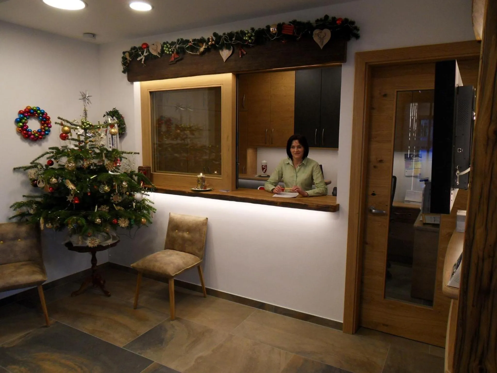 Lobby or reception in Hotel Garni Siegmundshof - inclusive Joker Card im Sommer