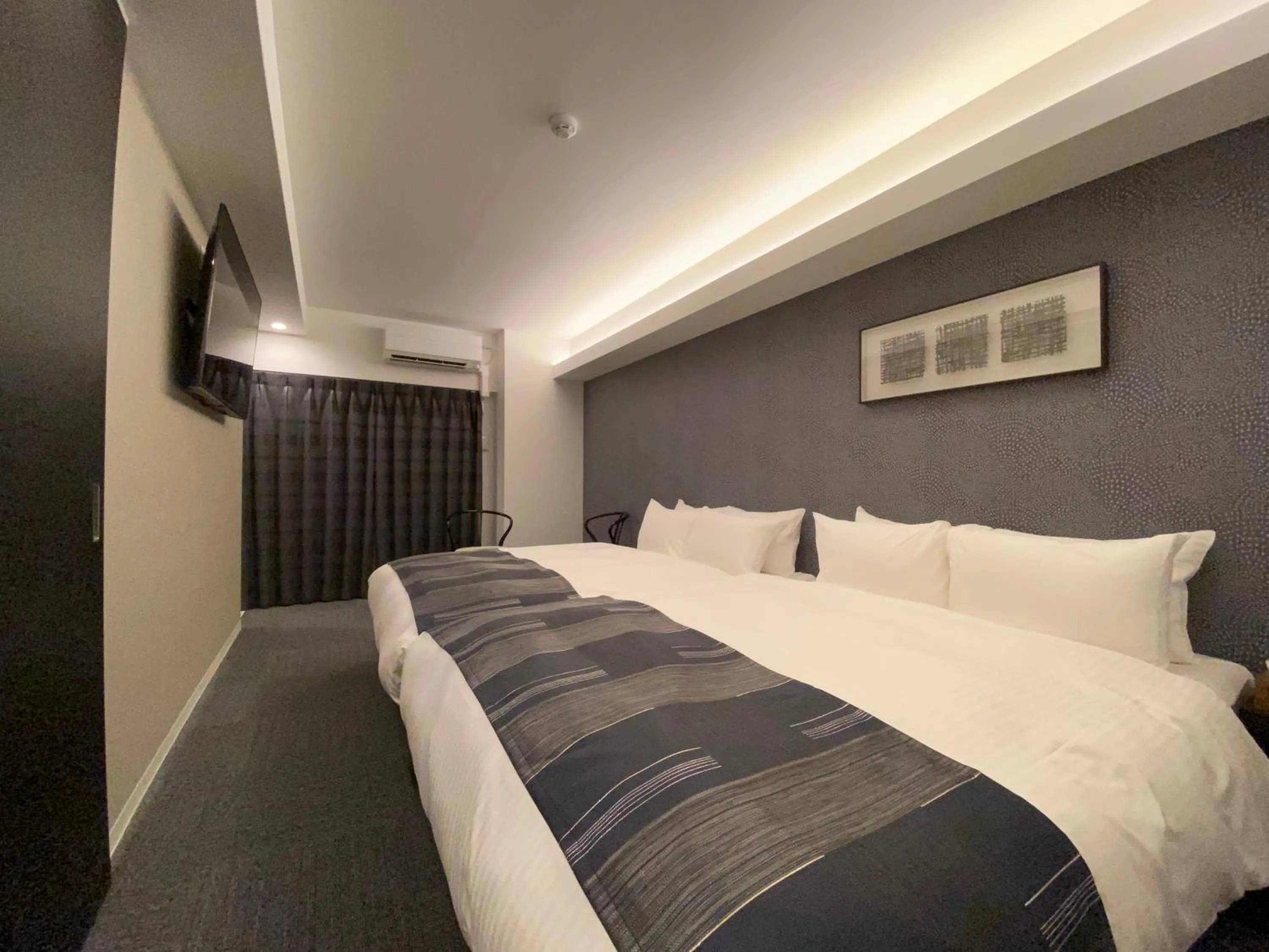 Bedroom, Bed in Randor Residential Hotel Fukuoka Classic
