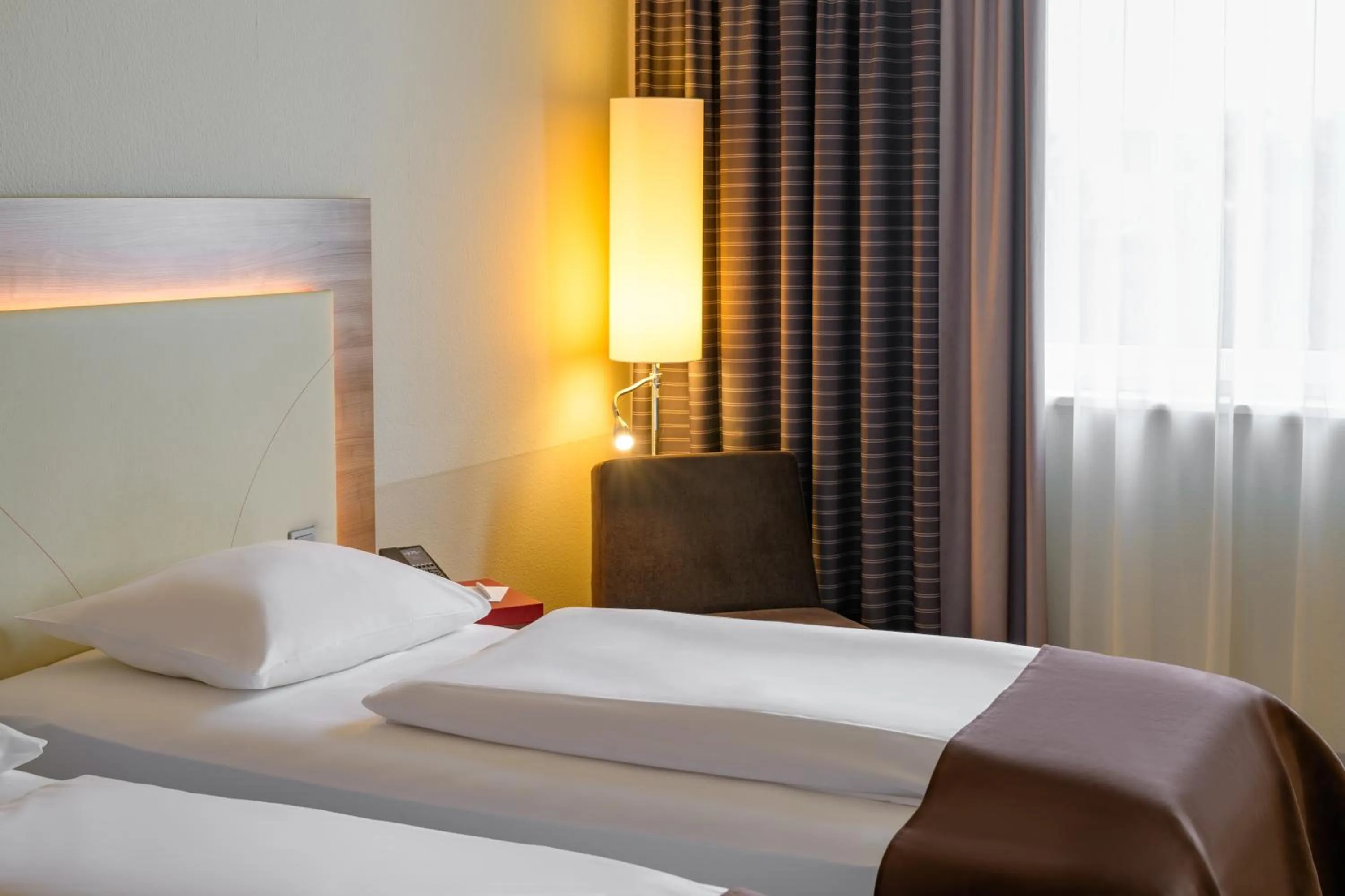 Bed in Mercure Hotel Stuttgart Airport Messe