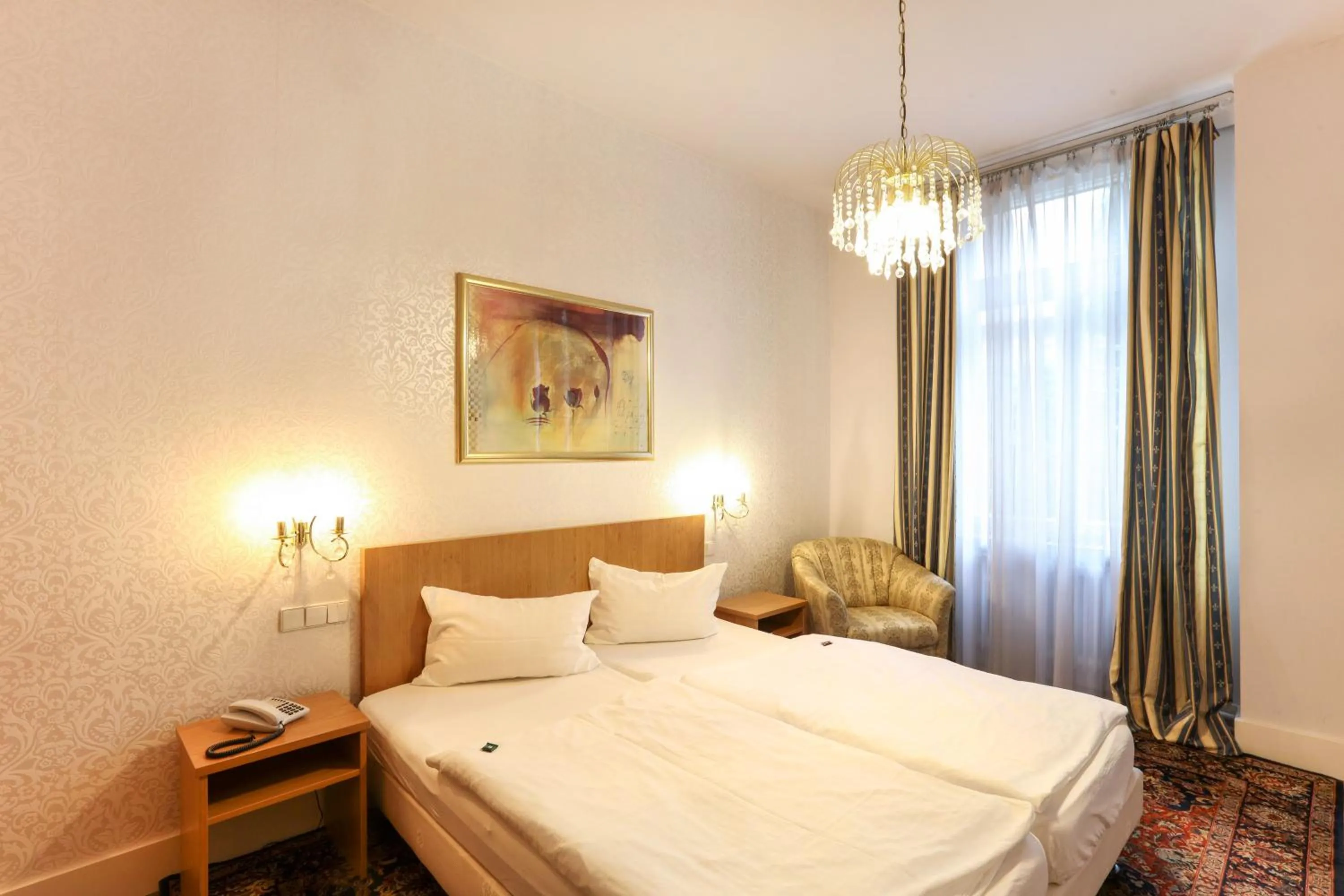 Photo of the whole room, Bed in Hotel Markgräfler Hof