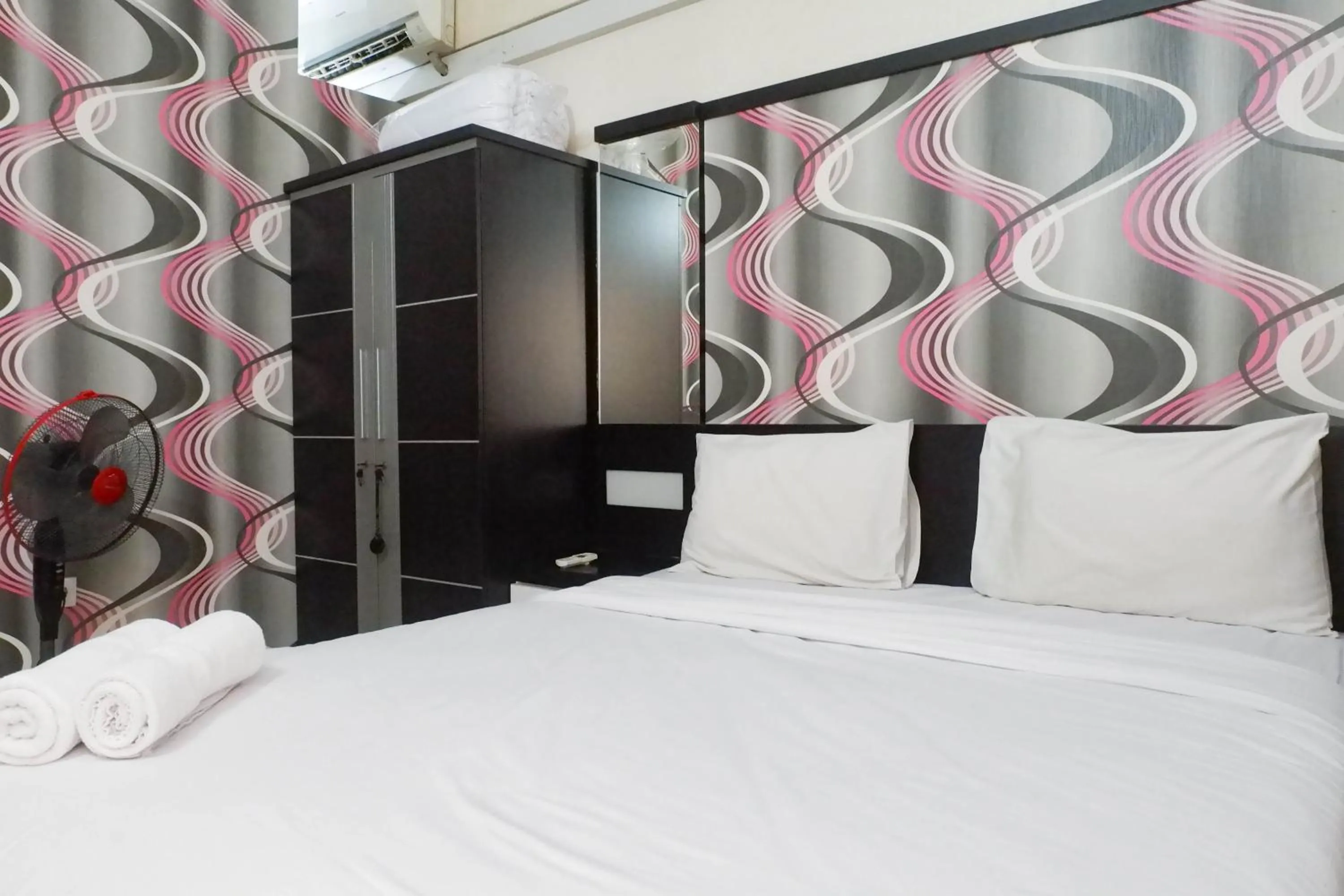 Bedroom, Bed in Minimalist 2BR Apartment at Dian Regency By Travelio