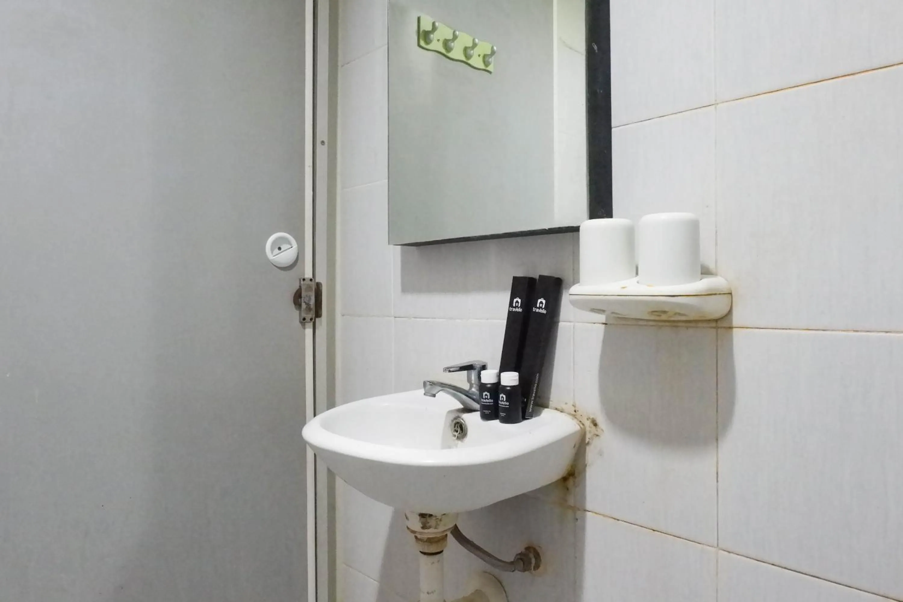 Bathroom in Minimalist 2BR Apartment at Dian Regency By Travelio