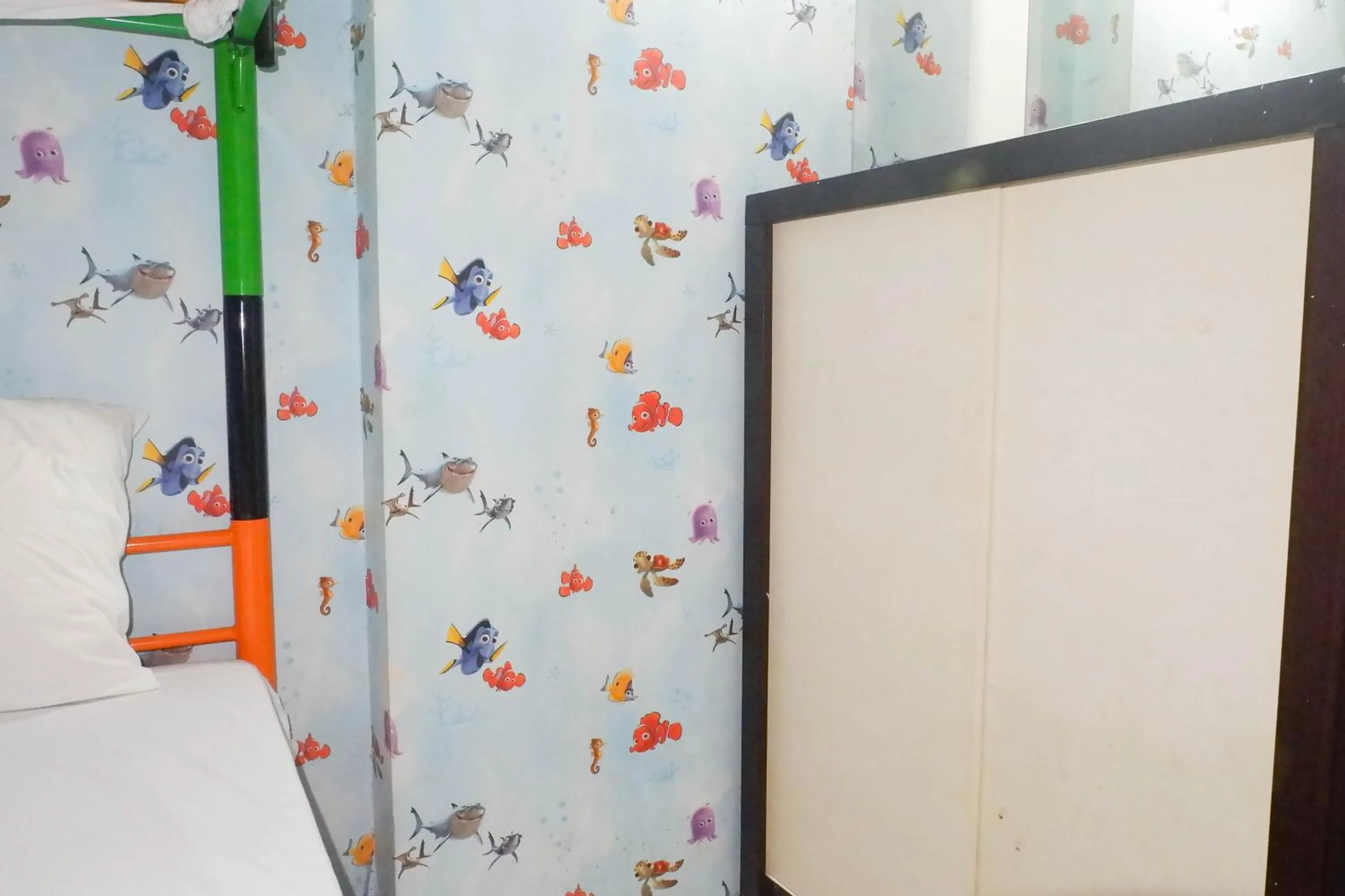 Bed in Minimalist 2BR Apartment at Dian Regency By Travelio