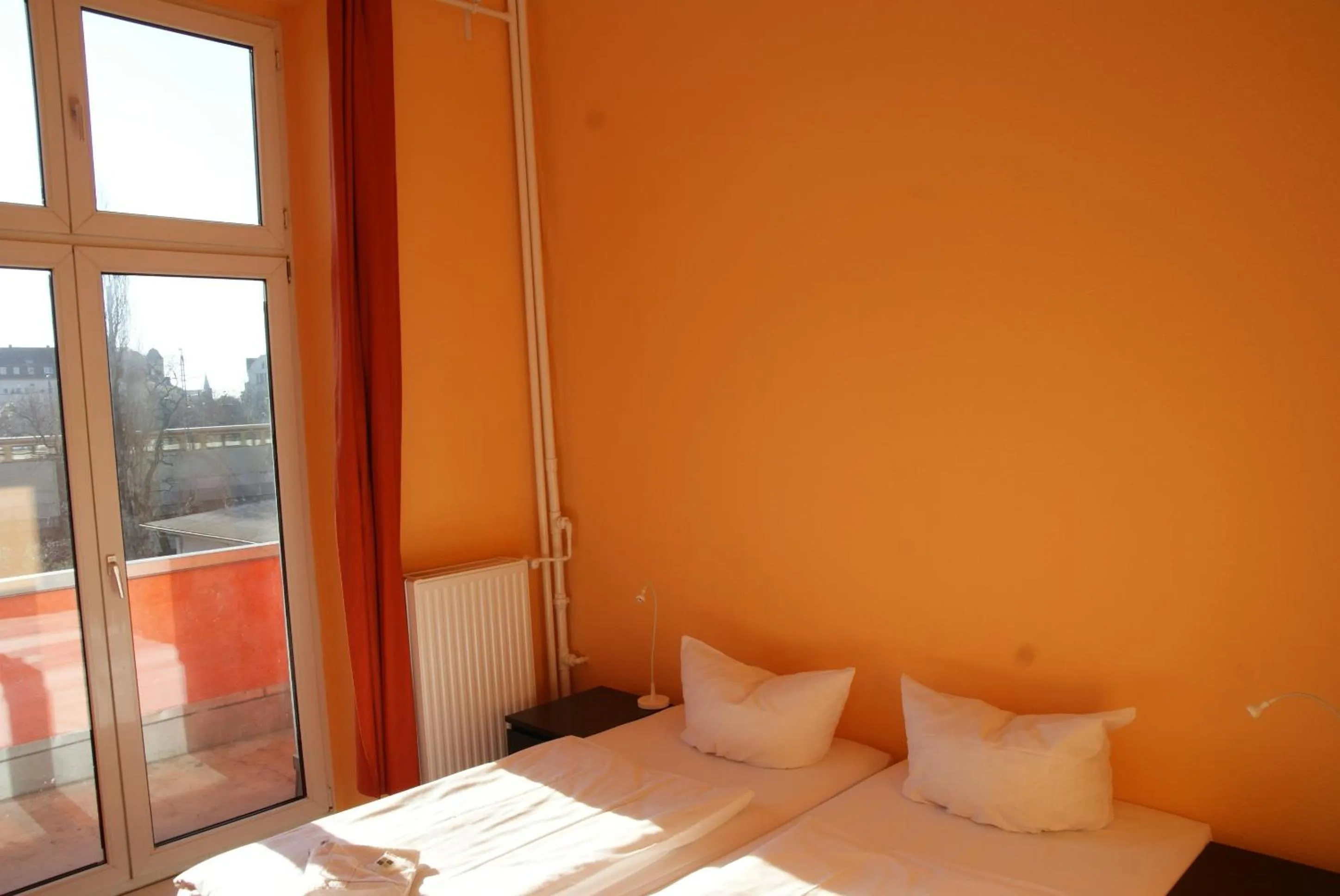 Bed in Happy Go Lucky Hotel + Hostel