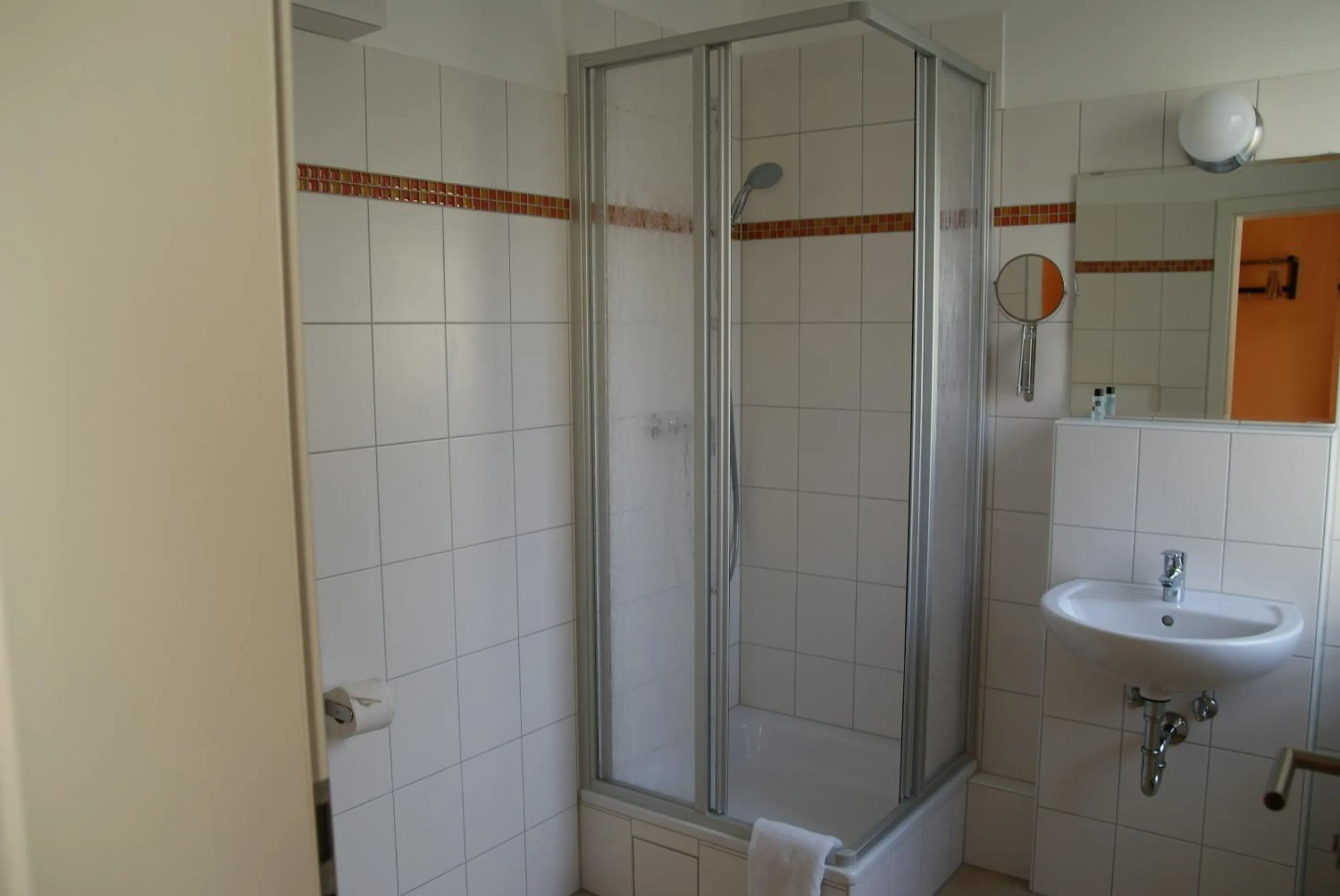 Bathroom in Happy Go Lucky Hotel + Hostel