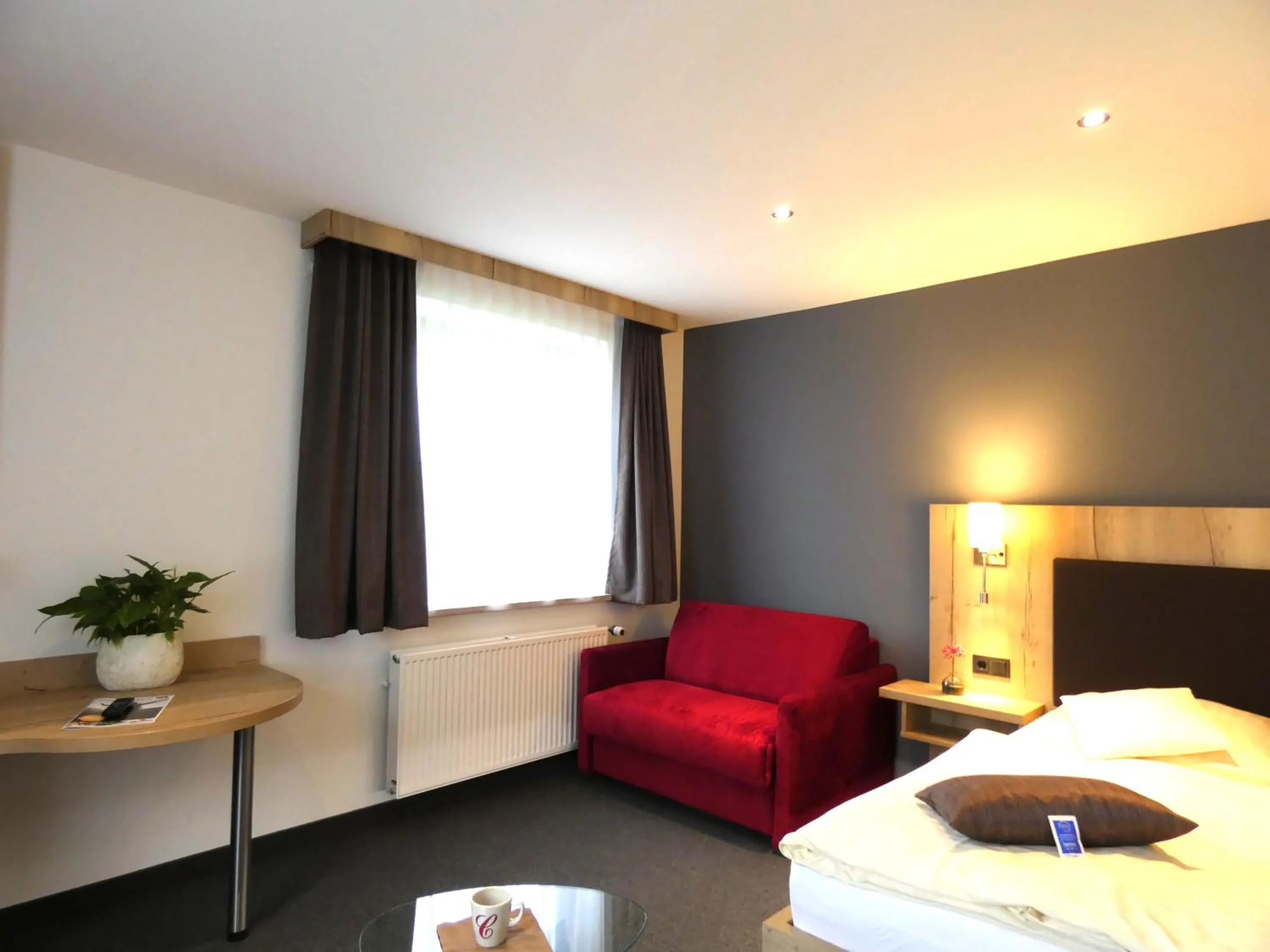 Photo of the whole room, Bed in Akzent Hotel Cordes & Restaurant am Rosengarten