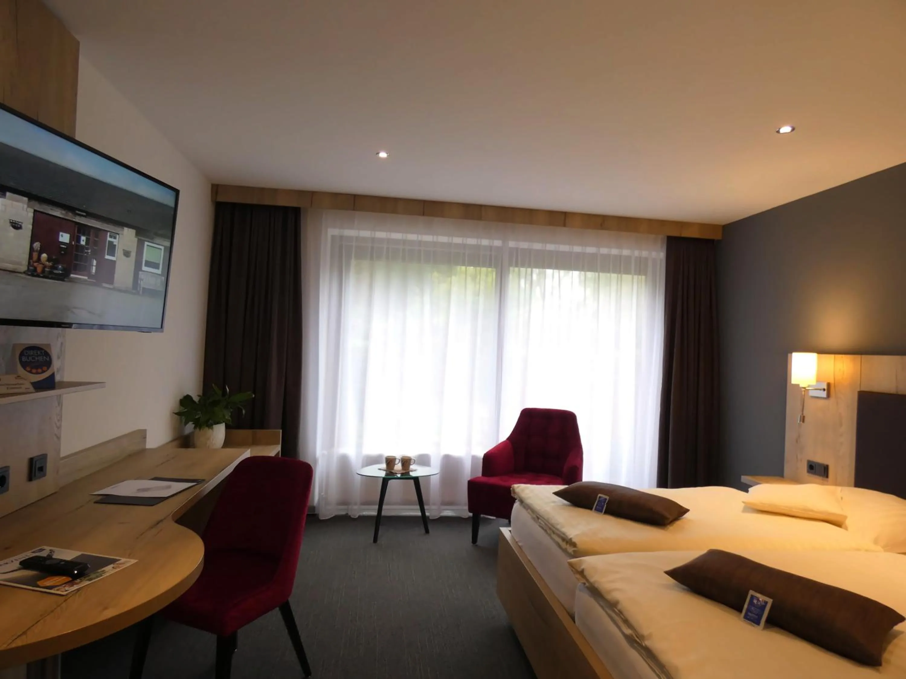 Photo of the whole room, Bed in Akzent Hotel Cordes & Restaurant am Rosengarten