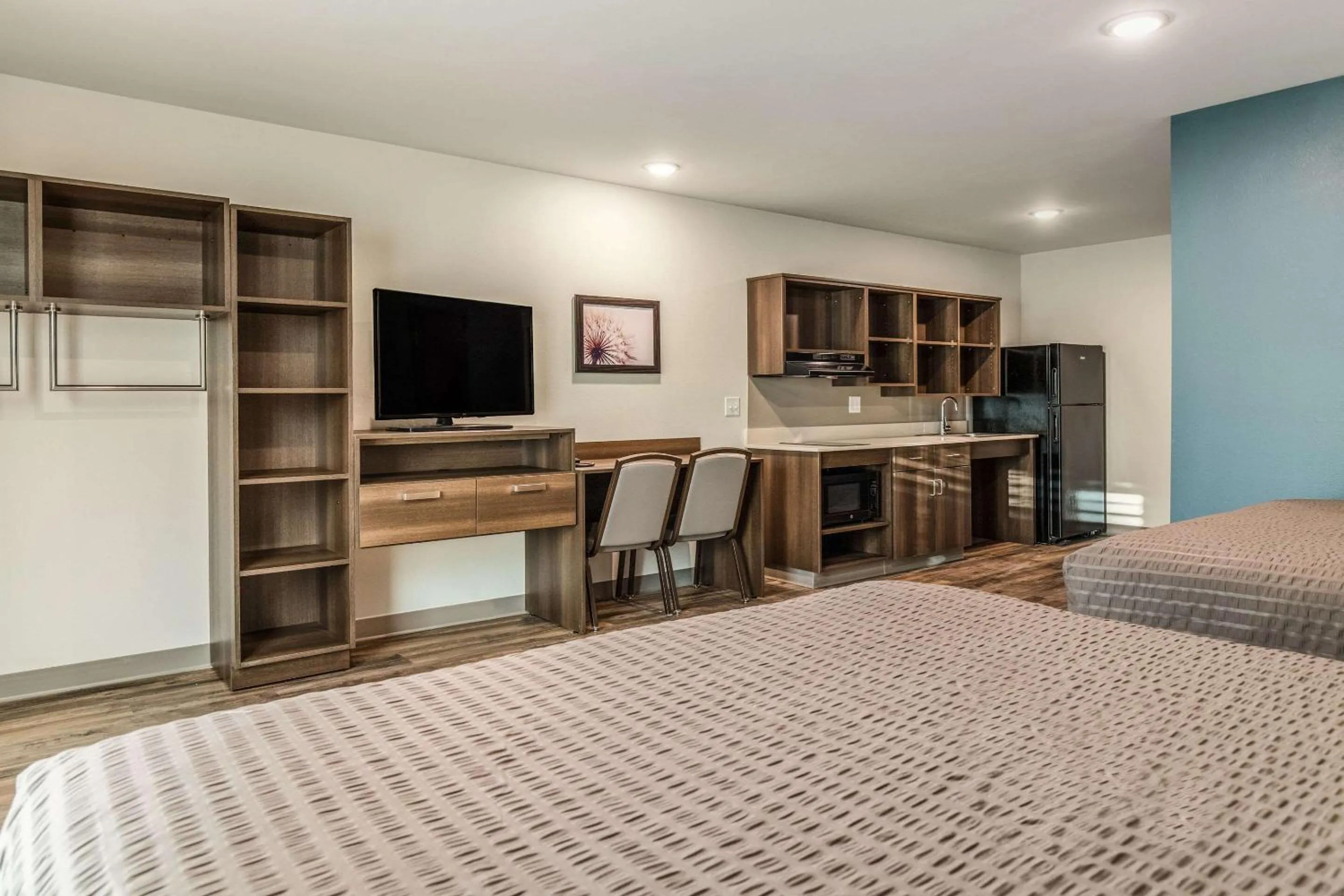 Photo of the whole room, Bed in WoodSpring Suites Greenville Haywood Mall