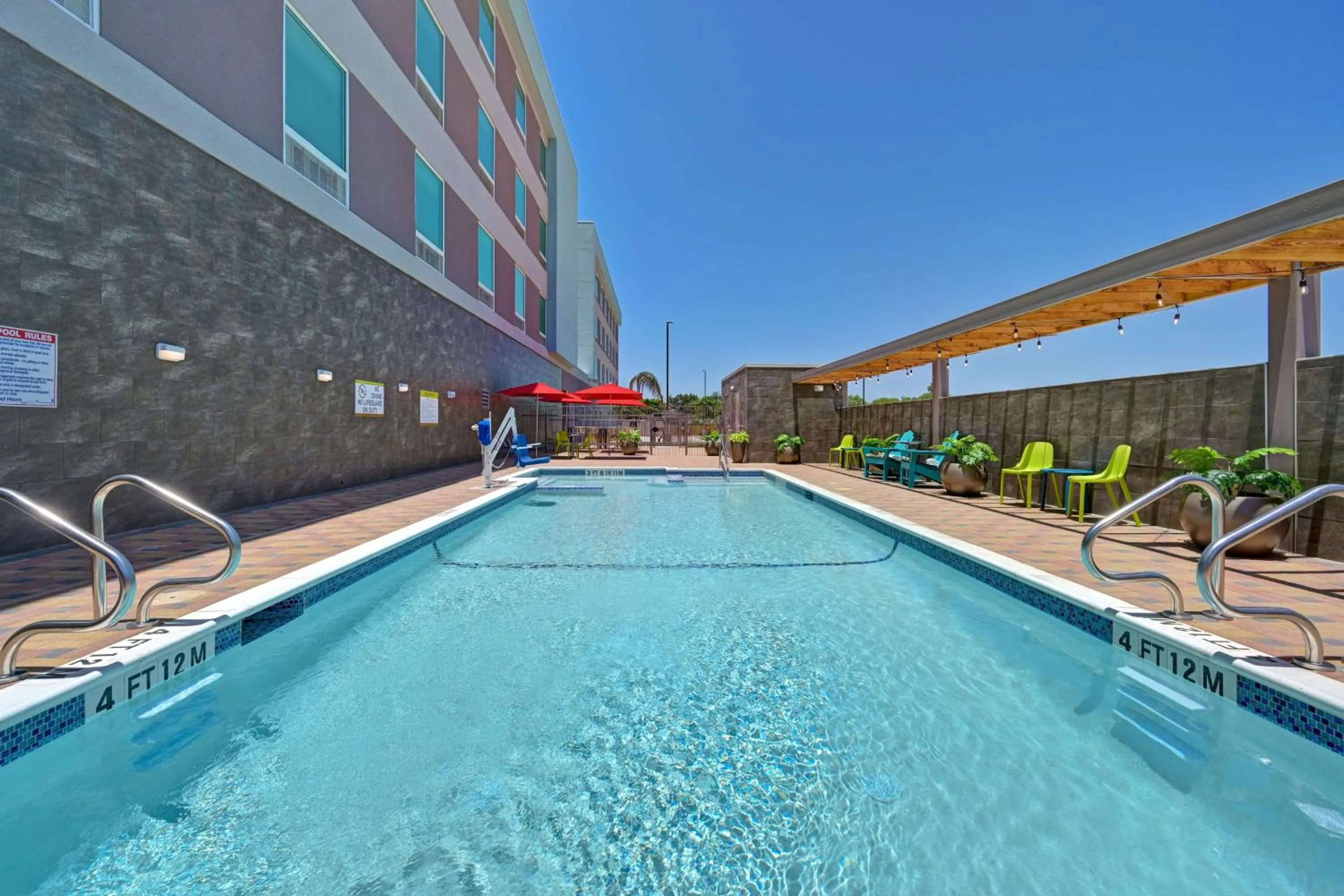 Pool view in Home2 Suites Corpus Christi Southeast, Tx