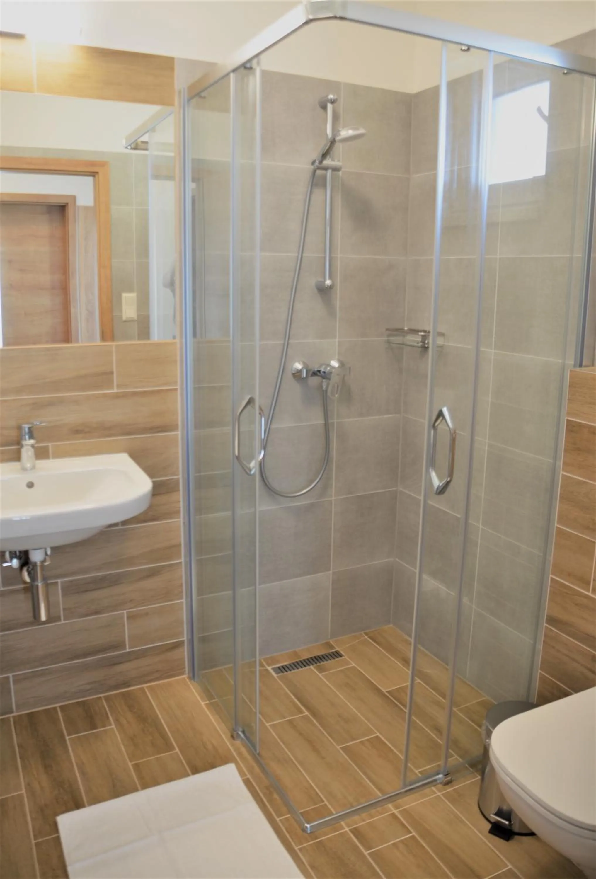 Shower in Apartmány Deluxe