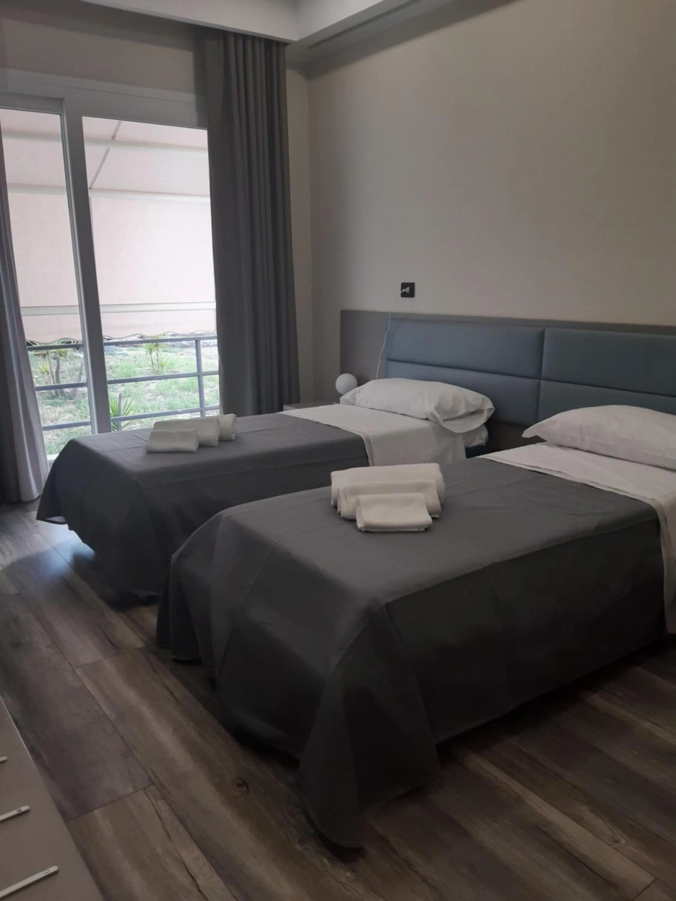 Bed in SARACENO HOTEL