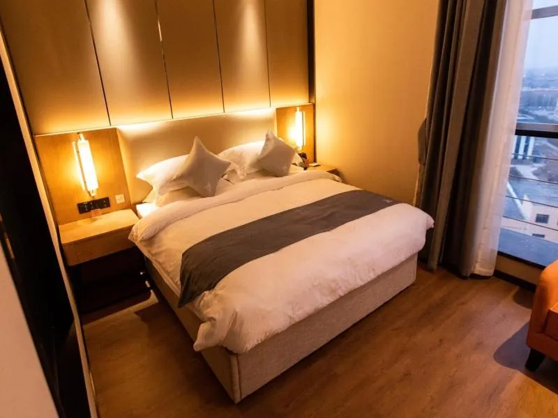 Bed in GreenTree Eastern Linyi Airport