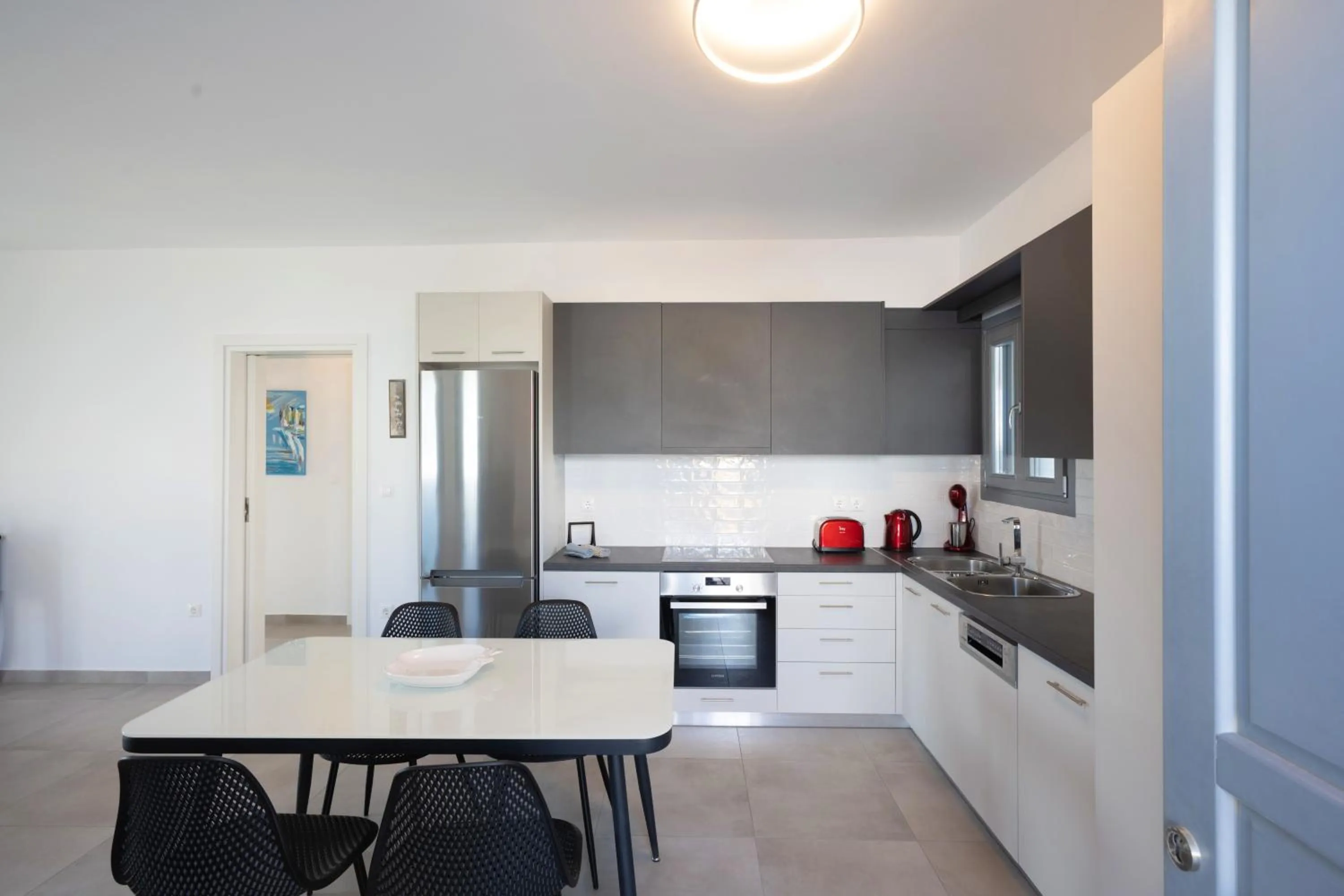 Kitchen or kitchenette in Mykonos Dot Apartments