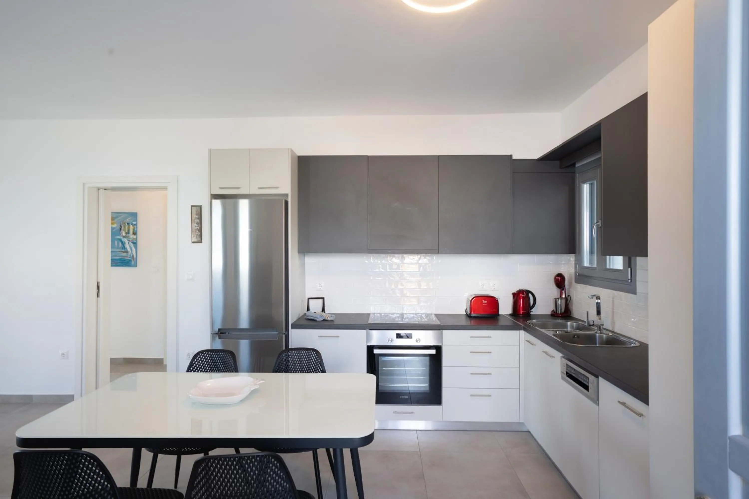 Kitchen or kitchenette in Mykonos Dot Apartments