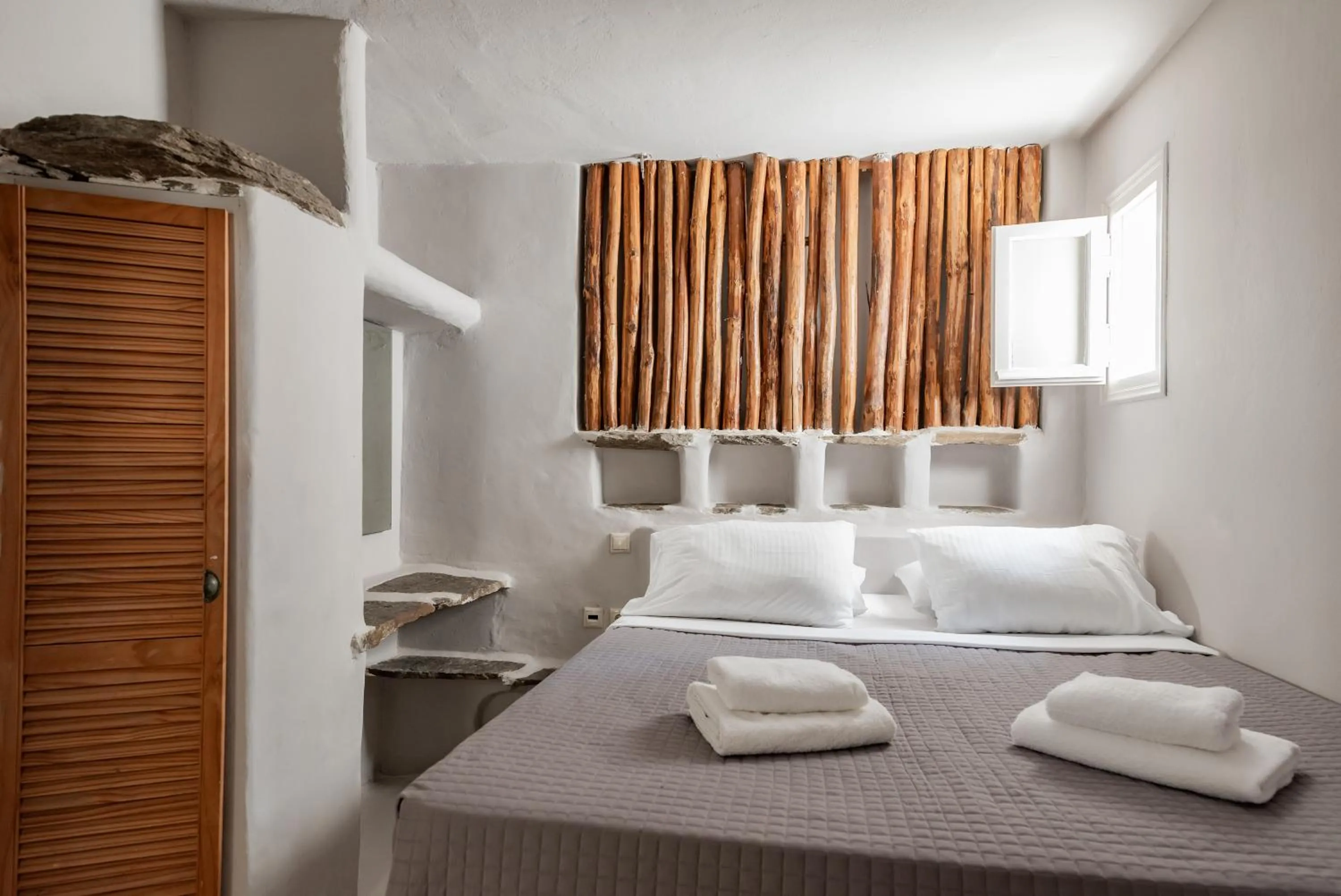 Bed in Rania Apartments Sea View