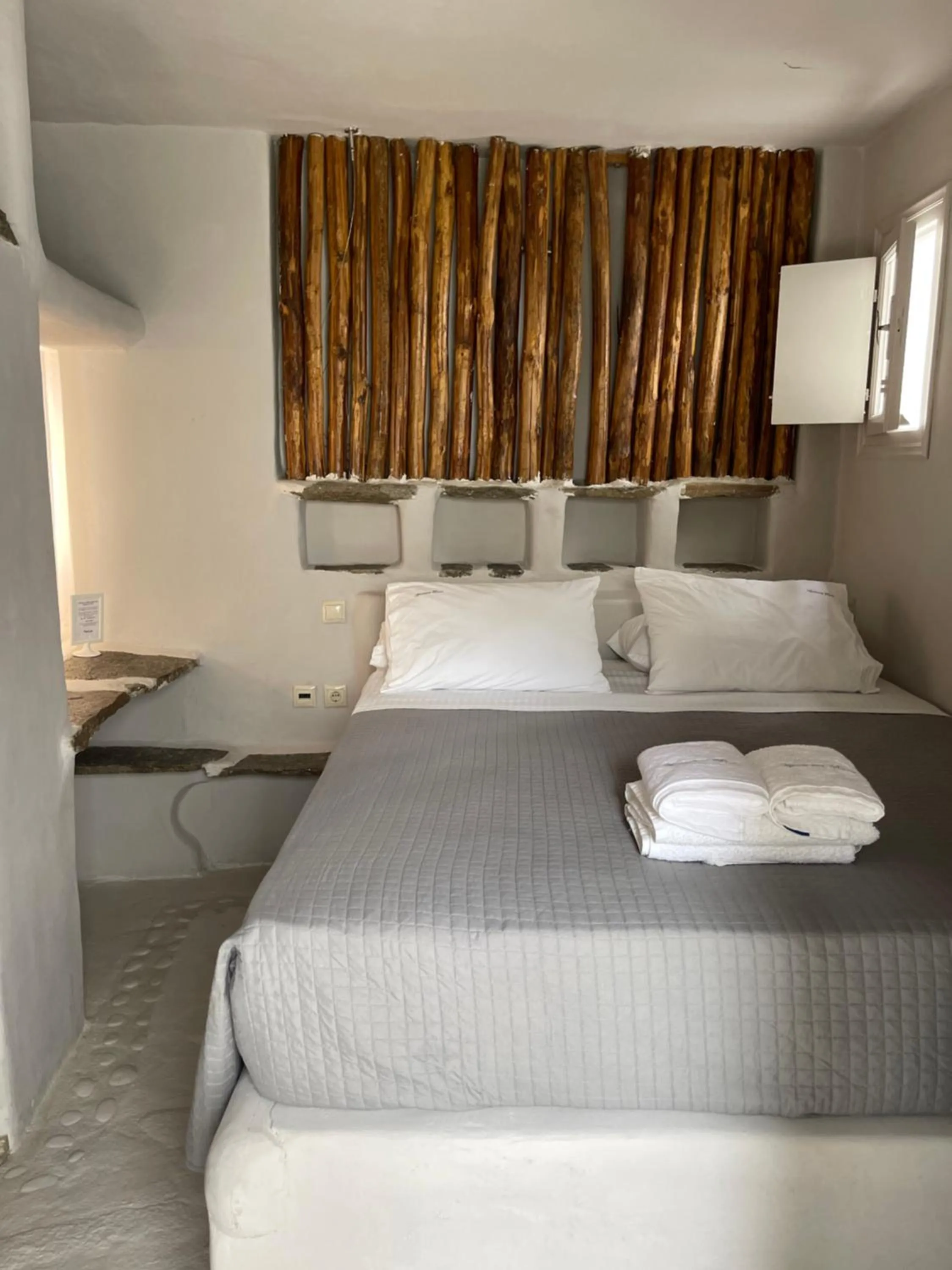 Bed in Rania Apartments Sea View