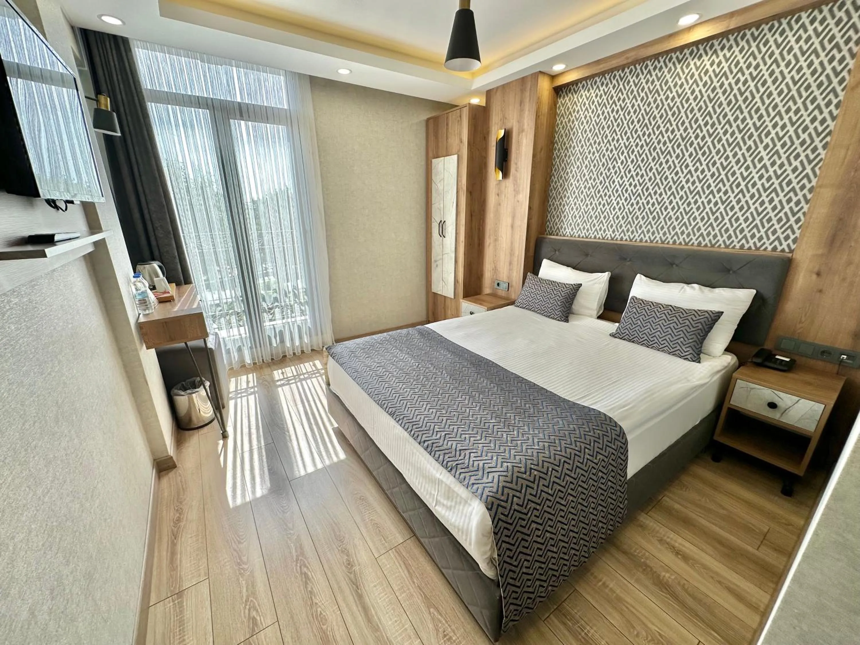 Bedroom, Bed in World Heritage Center Hotel