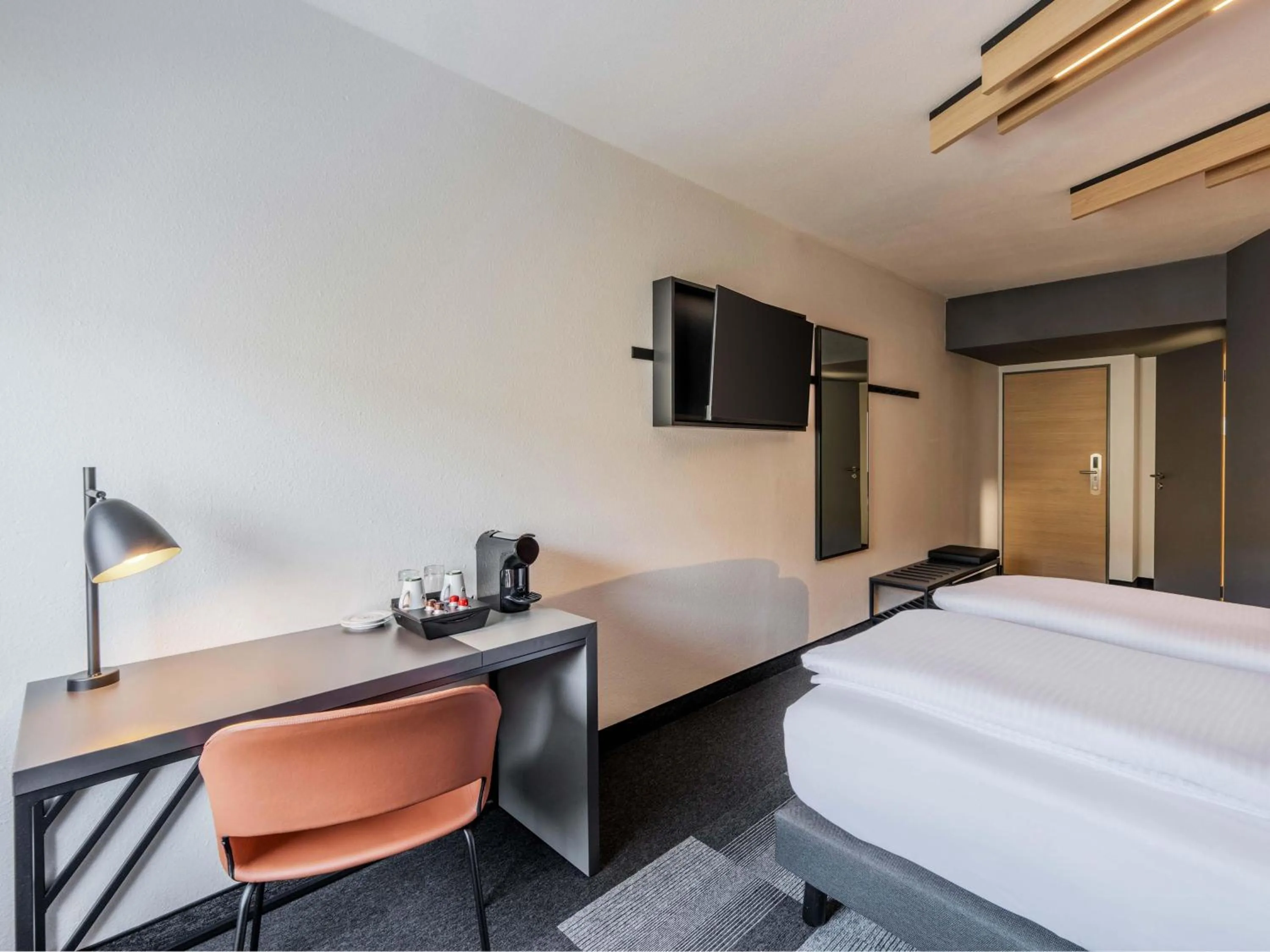 Photo of the whole room, Bed in B&B HOTEL München-Schwabing