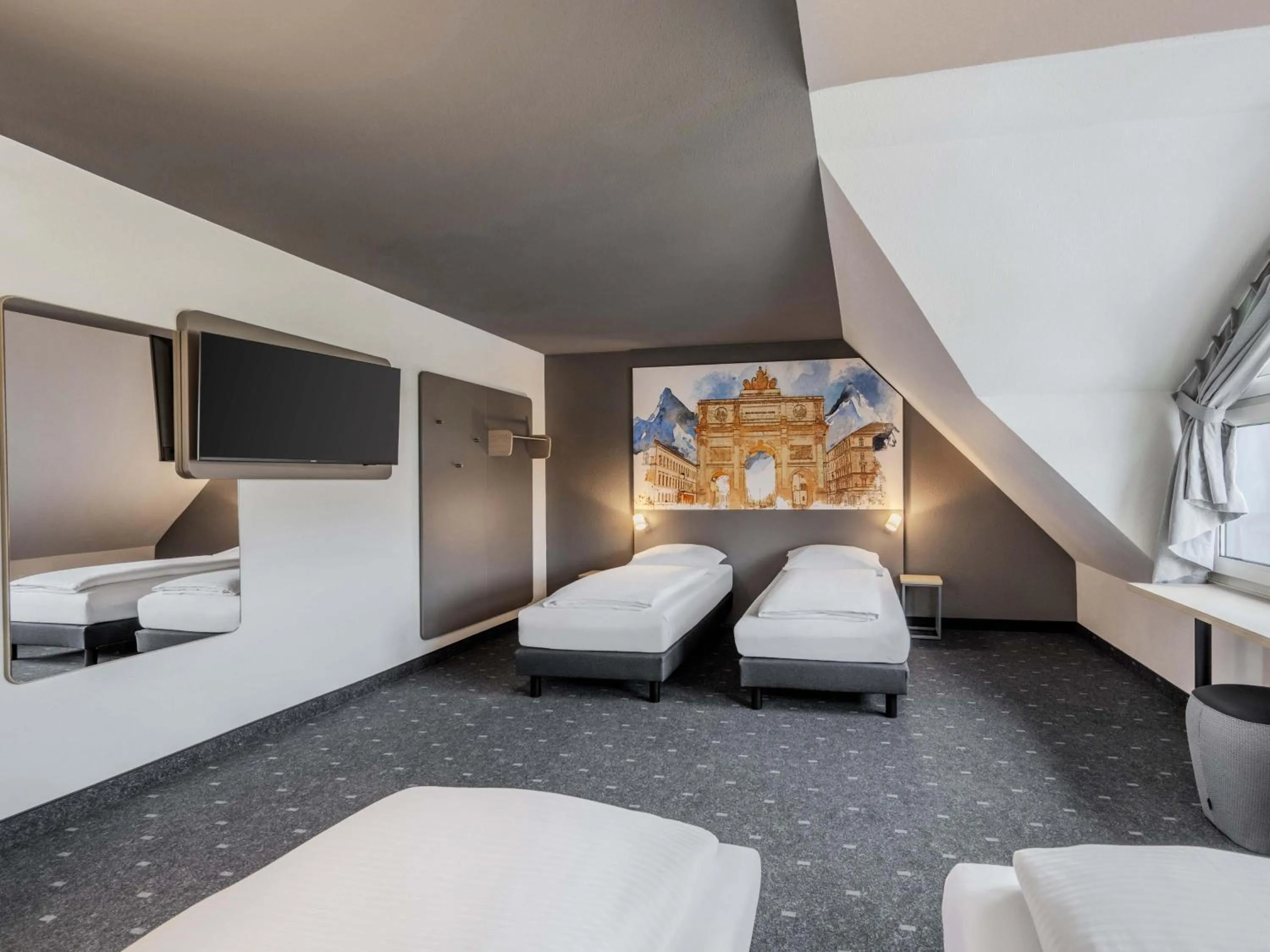 Photo of the whole room, Bed in B&B HOTEL München-Schwabing