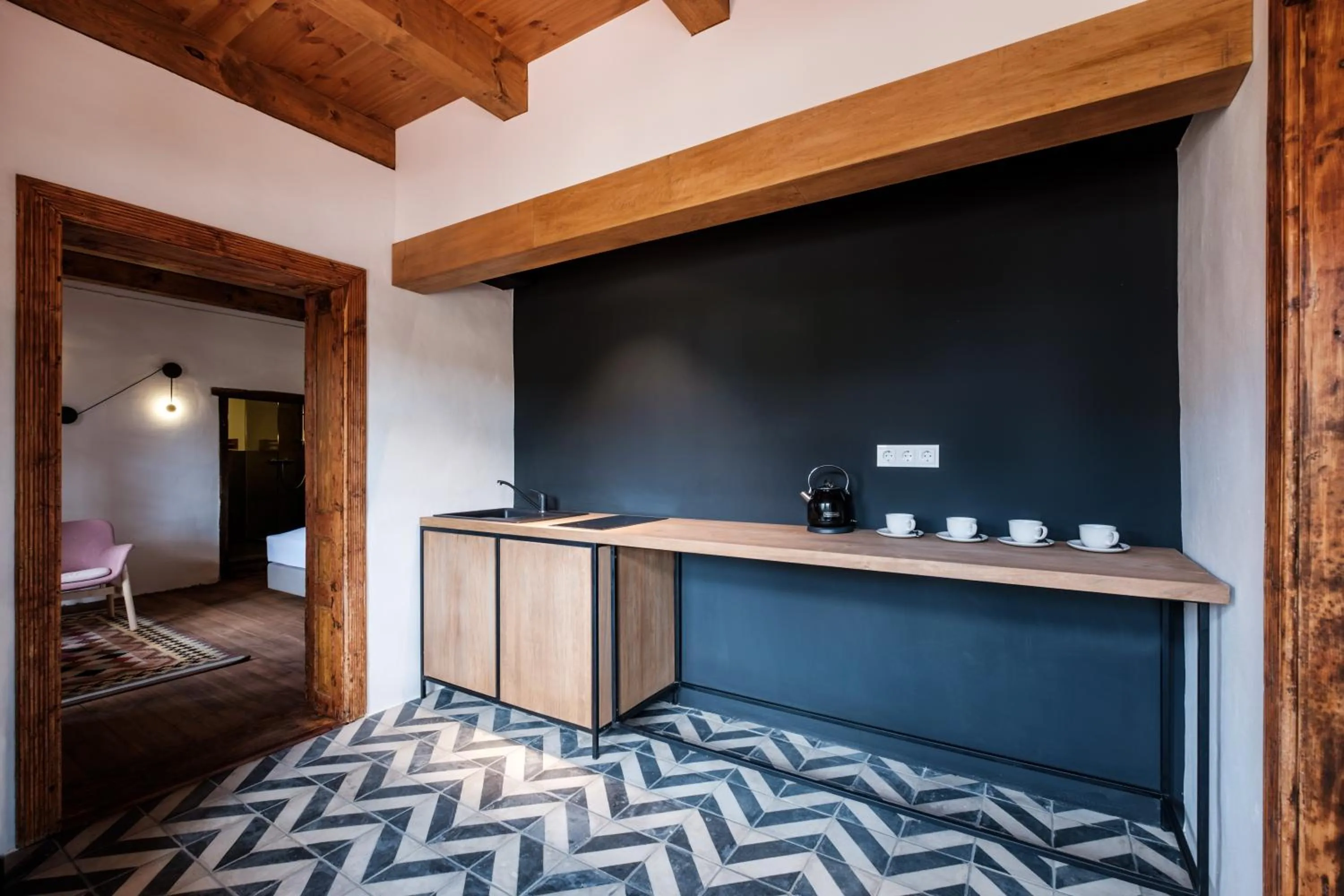 Kitchen or kitchenette in Almalomb Apartman