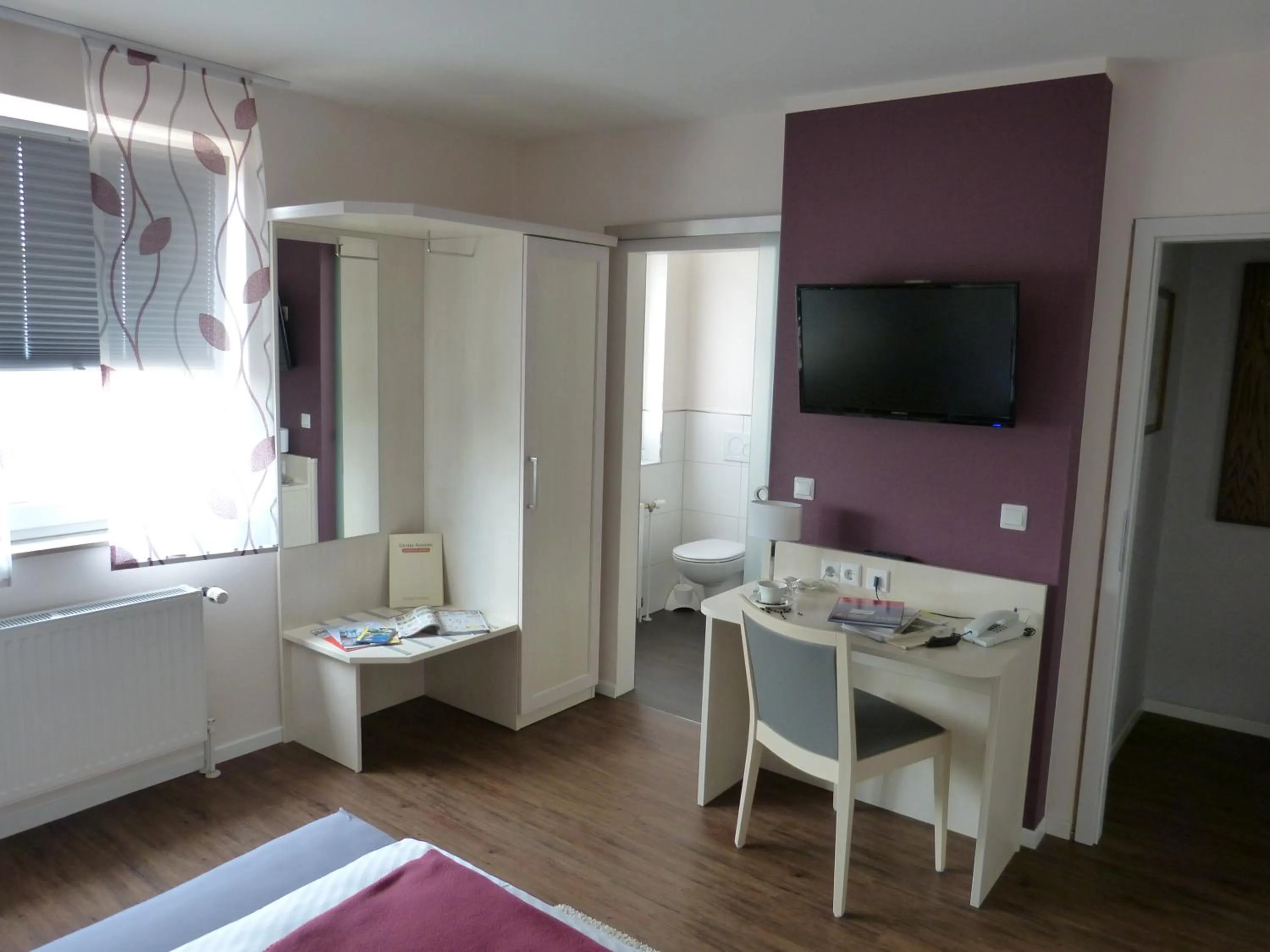 Photo of the whole room, Bed in Landgasthaus Gieseke-Asshorn