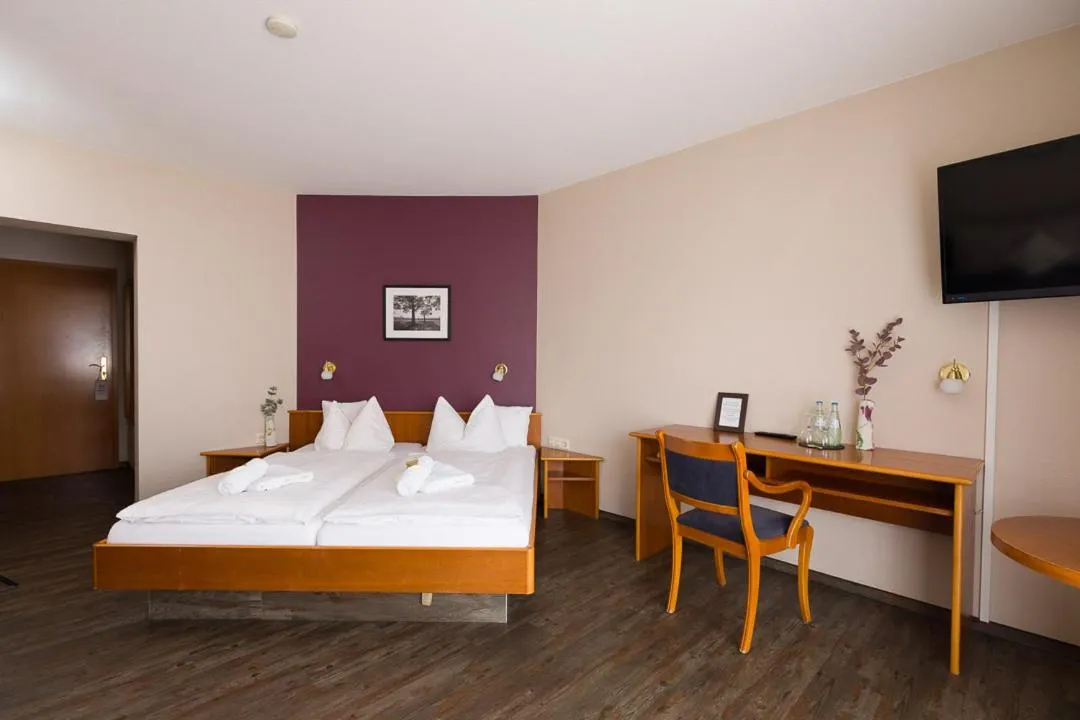 Photo of the whole room, Bed in Landgasthaus Gieseke-Asshorn