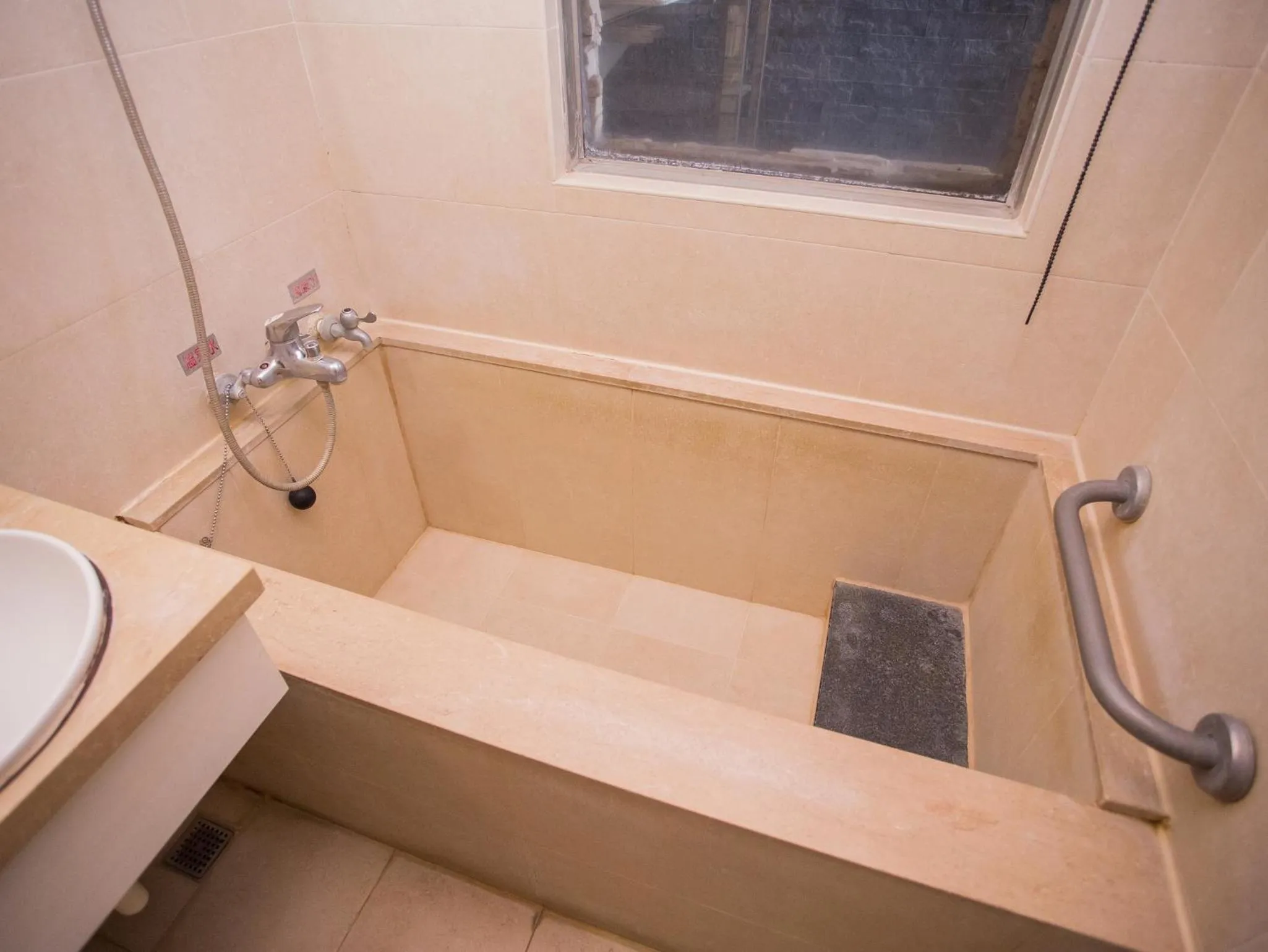 Bathroom in Mei Jia Mei Hotel