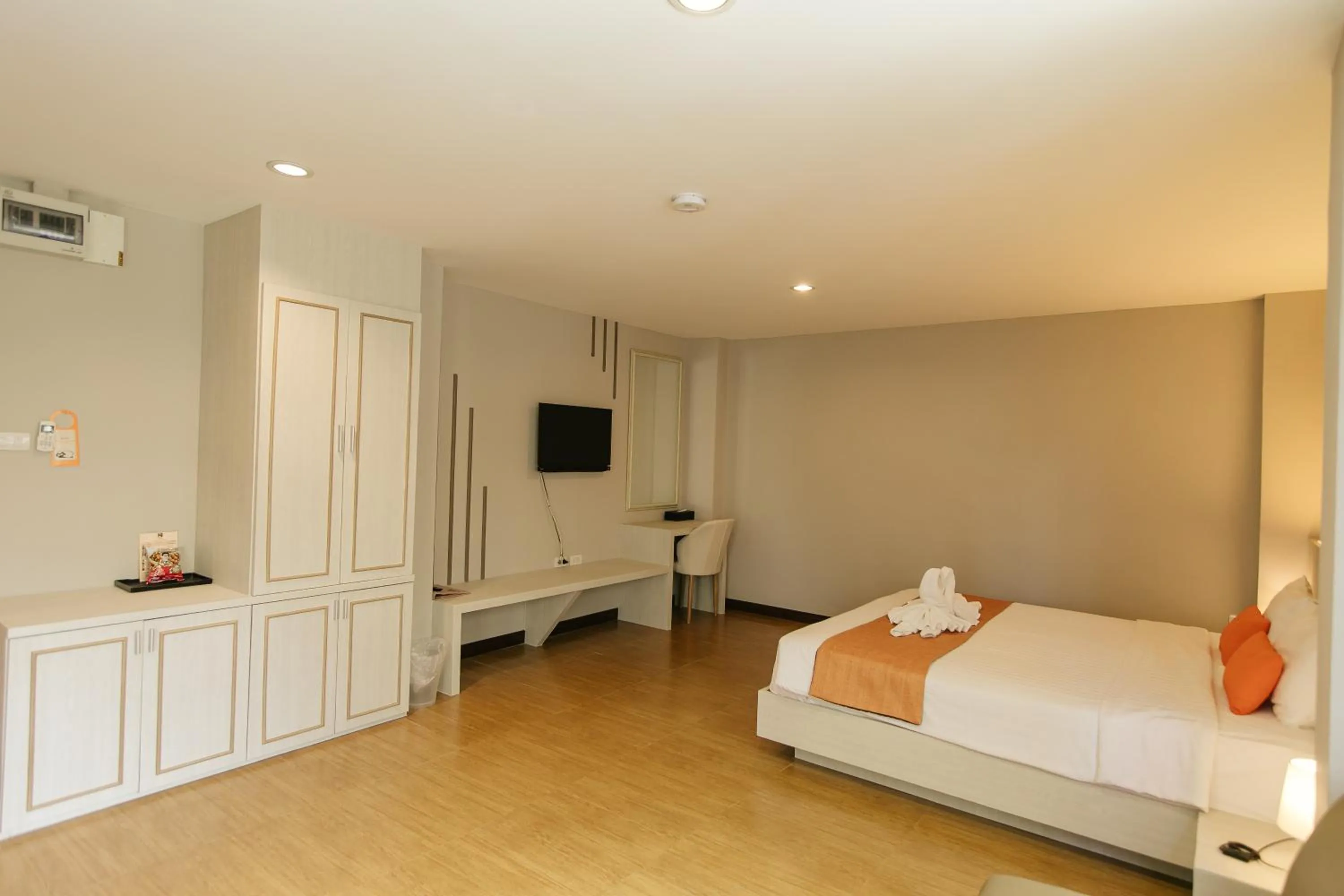 Bed in De Hug Hotel & Residence