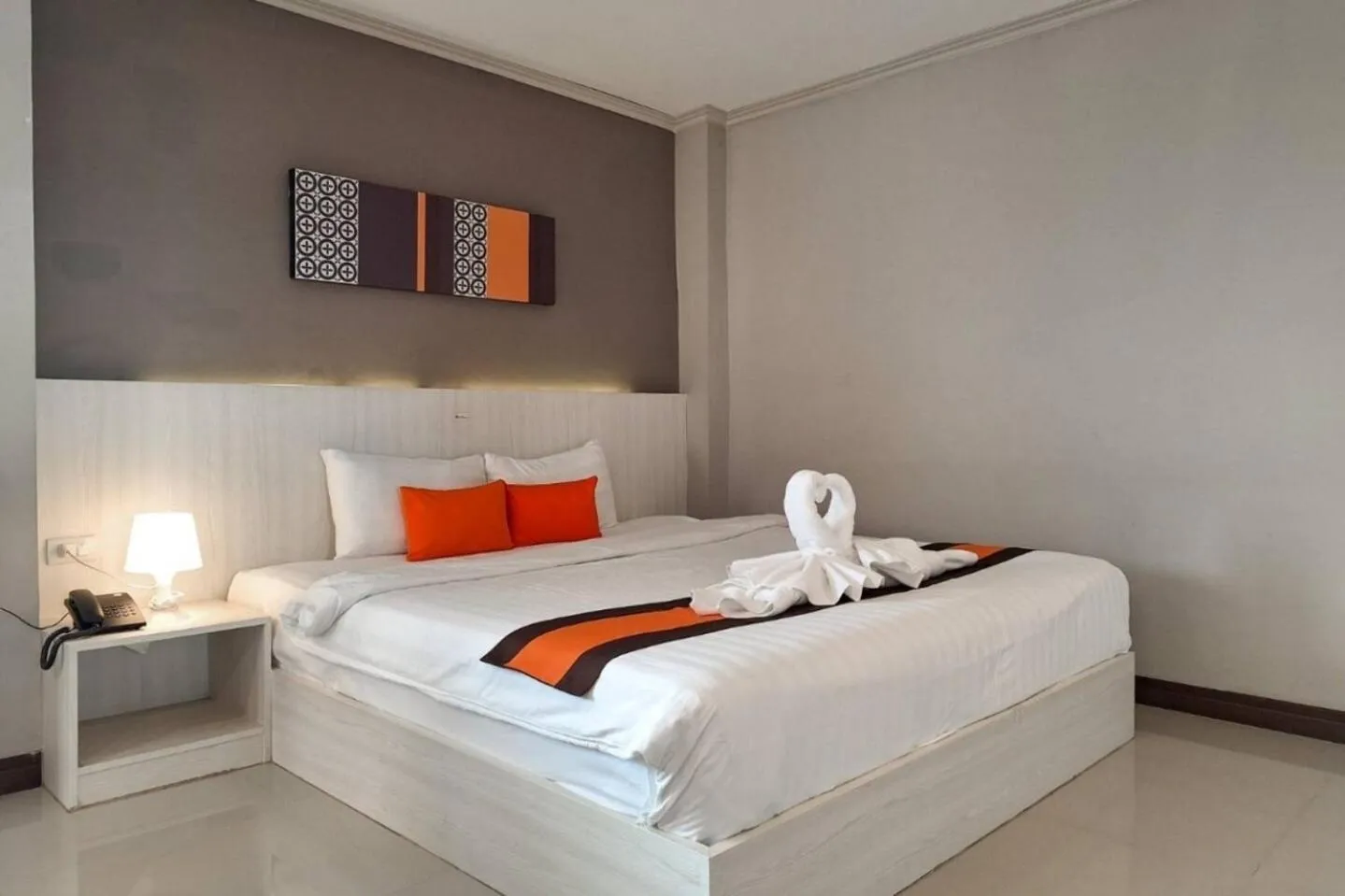 Bed in De Hug Hotel & Residence