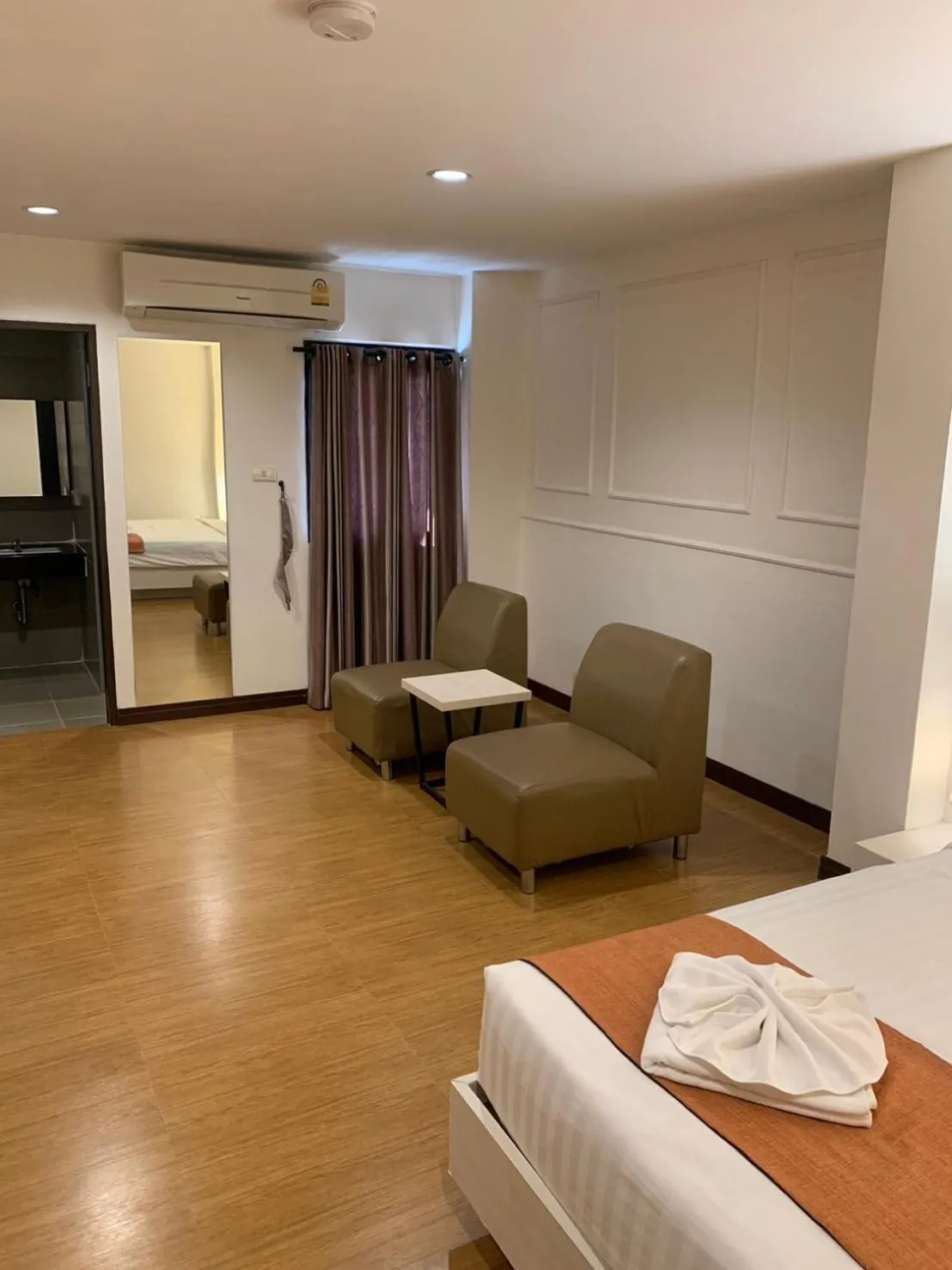 Bed in De Hug Hotel & Residence