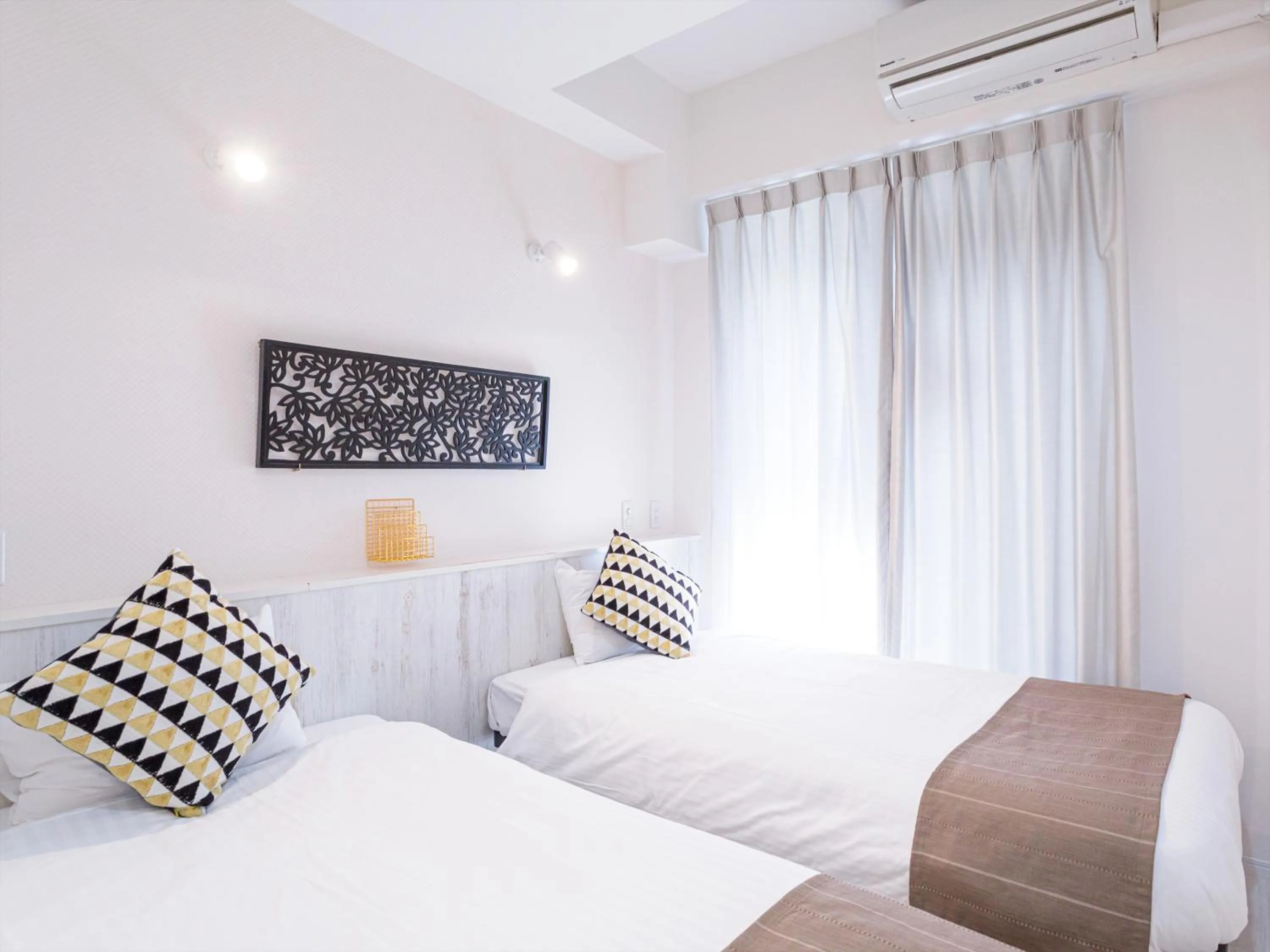 Photo of the whole room, Bed in かりゆしコンドミニアムリゾート那覇スカイリビングホテル旭橋駅前