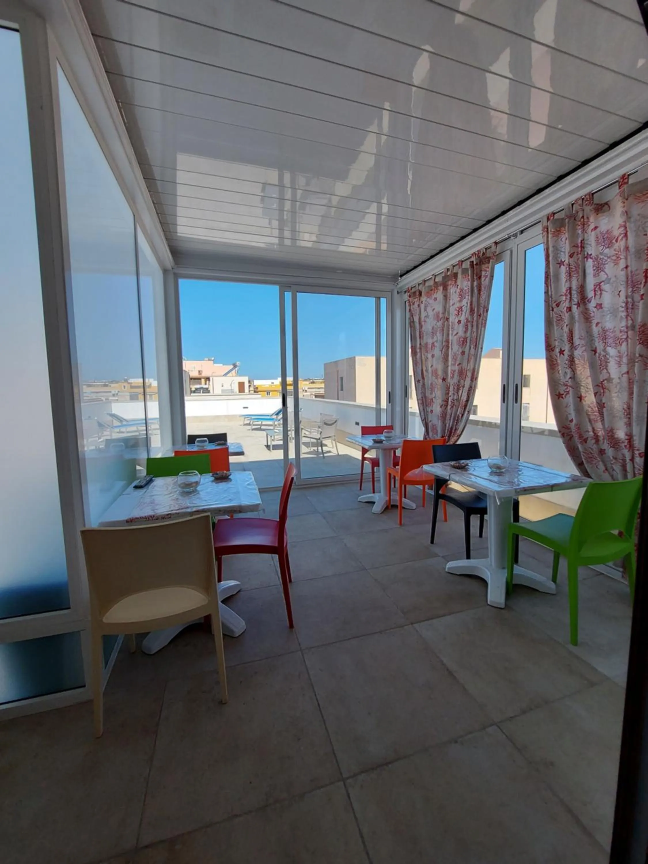 Communal lounge/ TV room in B&B La Casa di Pino