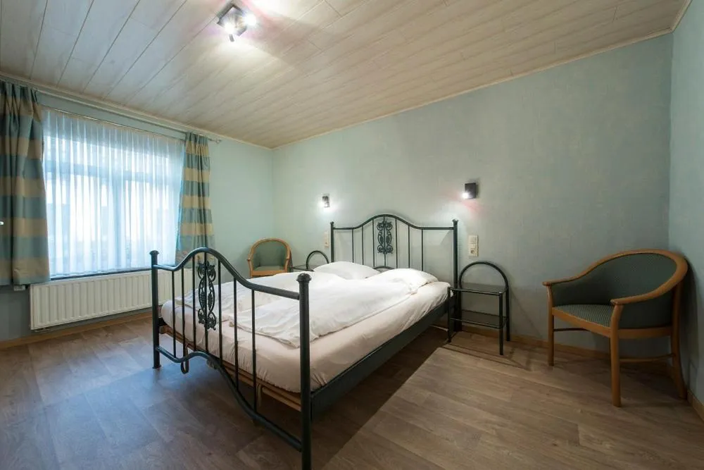 Bed in Appart Hotel Au Pied de Vigne