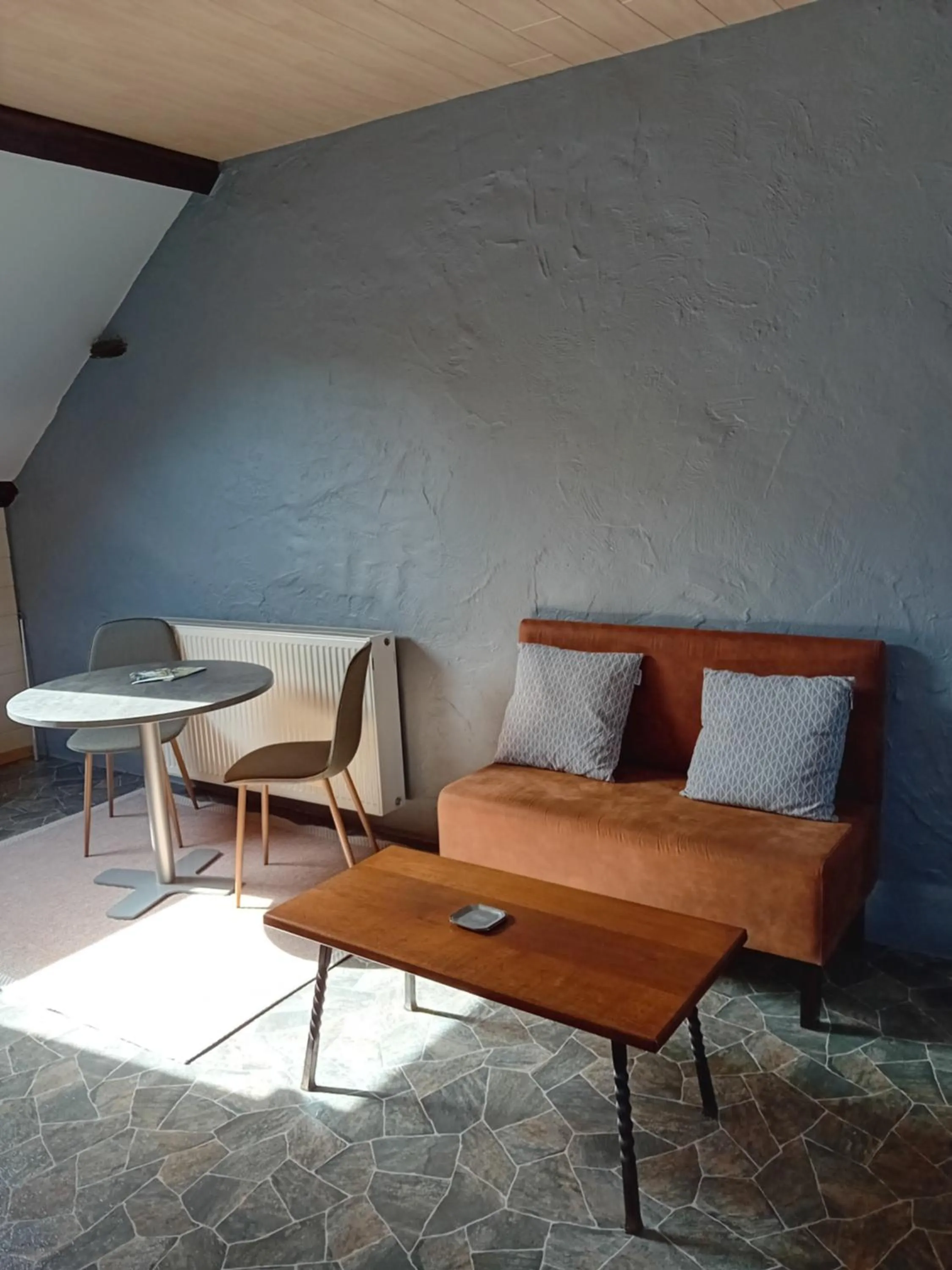 Living room in Appart Hotel Au Pied de Vigne