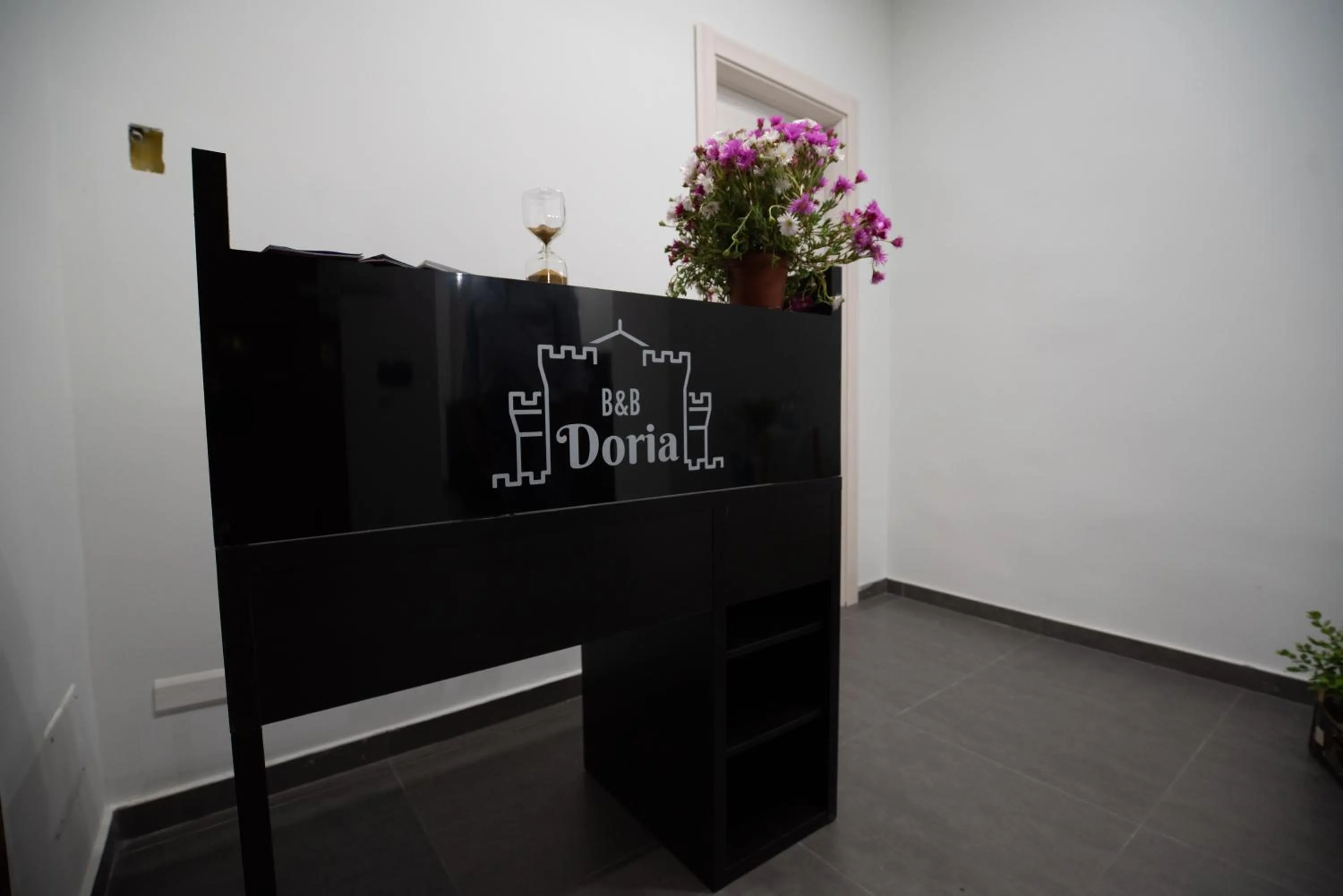 Property logo or sign in Doria Suites Napoli