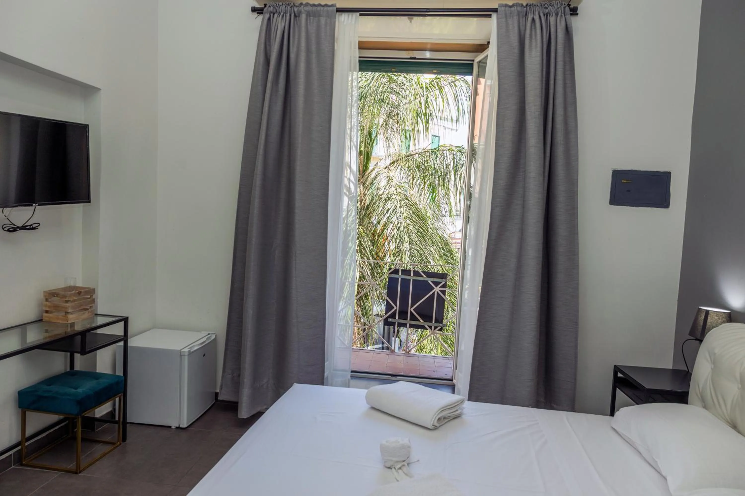 Bed in Doria Suites Napoli